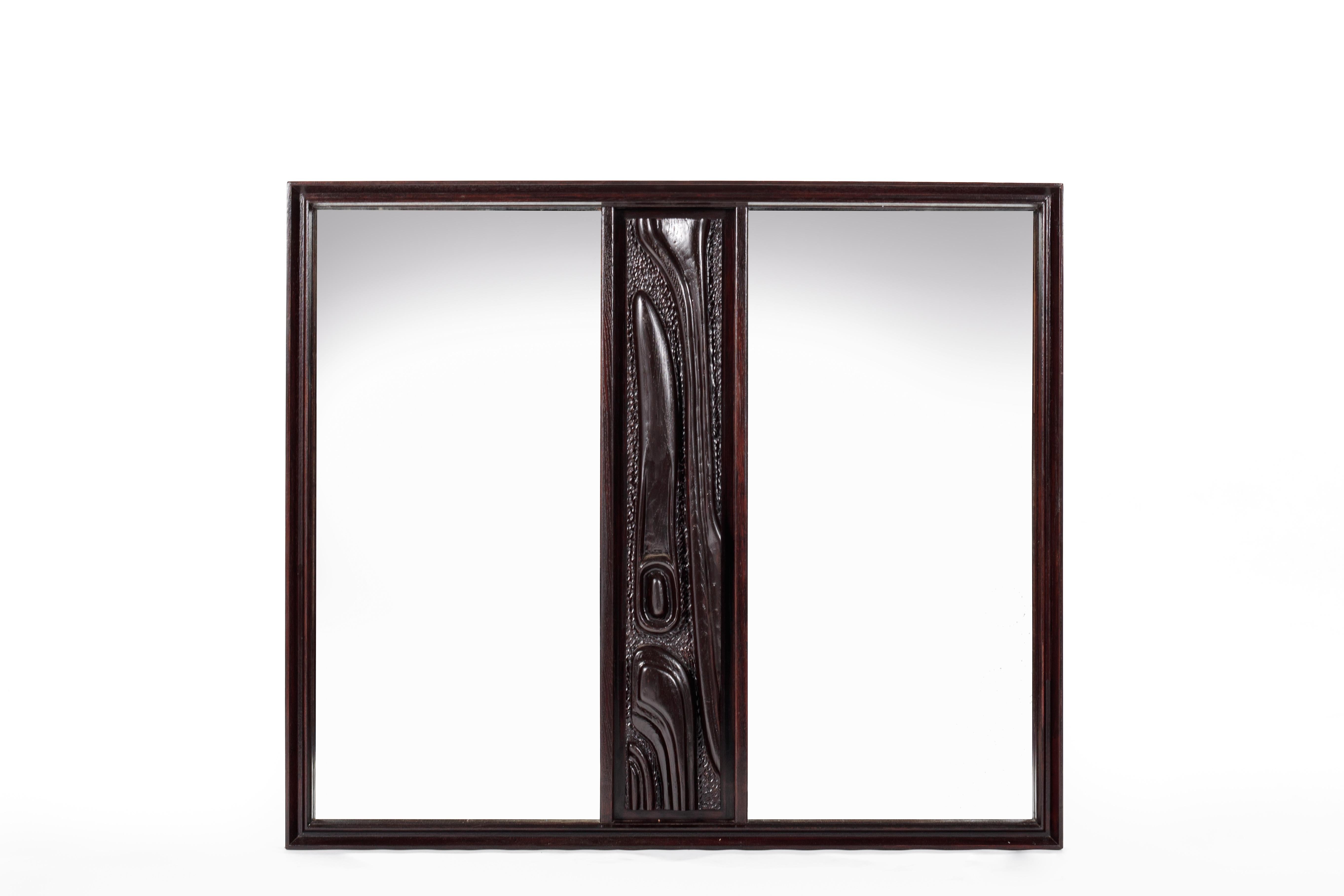 This BOLD mirror features warm, rich walnut woodgrains with a sculpted oceanic front panel full of Brutalist influences. Use as a versatile stand alone piece or message us and ask about a pairing with another Oceanic Pulaski credenza or dresser.