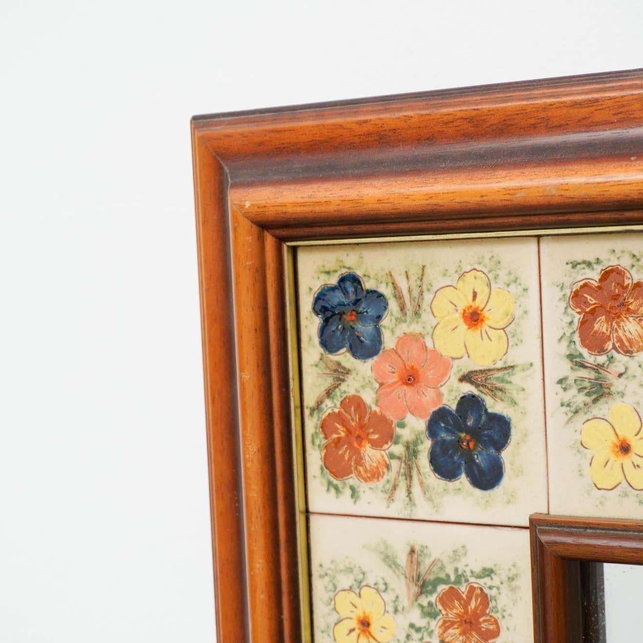 Mid-Century Modern wood and ceramic rustic mirror, circa 1970.  By unknown manufacturer (Spain)    In original condition with minor wear consistent of age and use, preserving a beautiful patina.