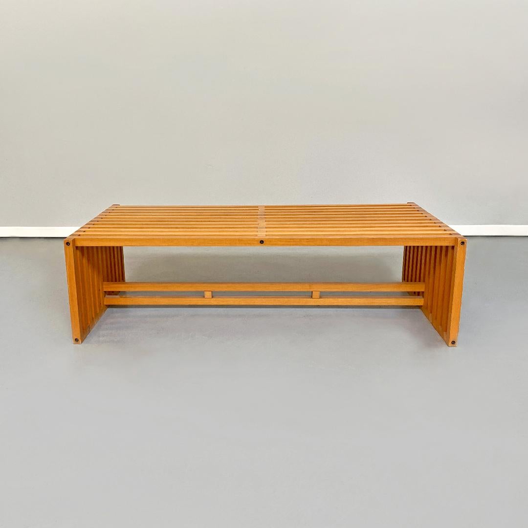 Italian Mid-Century Modern wood coffee table mod. Ara by Lella and Massimo Vignelli for Driade, 1970s
Wood coffee table, mod. Ara with wooden slats structure.
Designed in the 1970s by Lella and Massimo Vignelli for Driade.

This is a fantastic bench