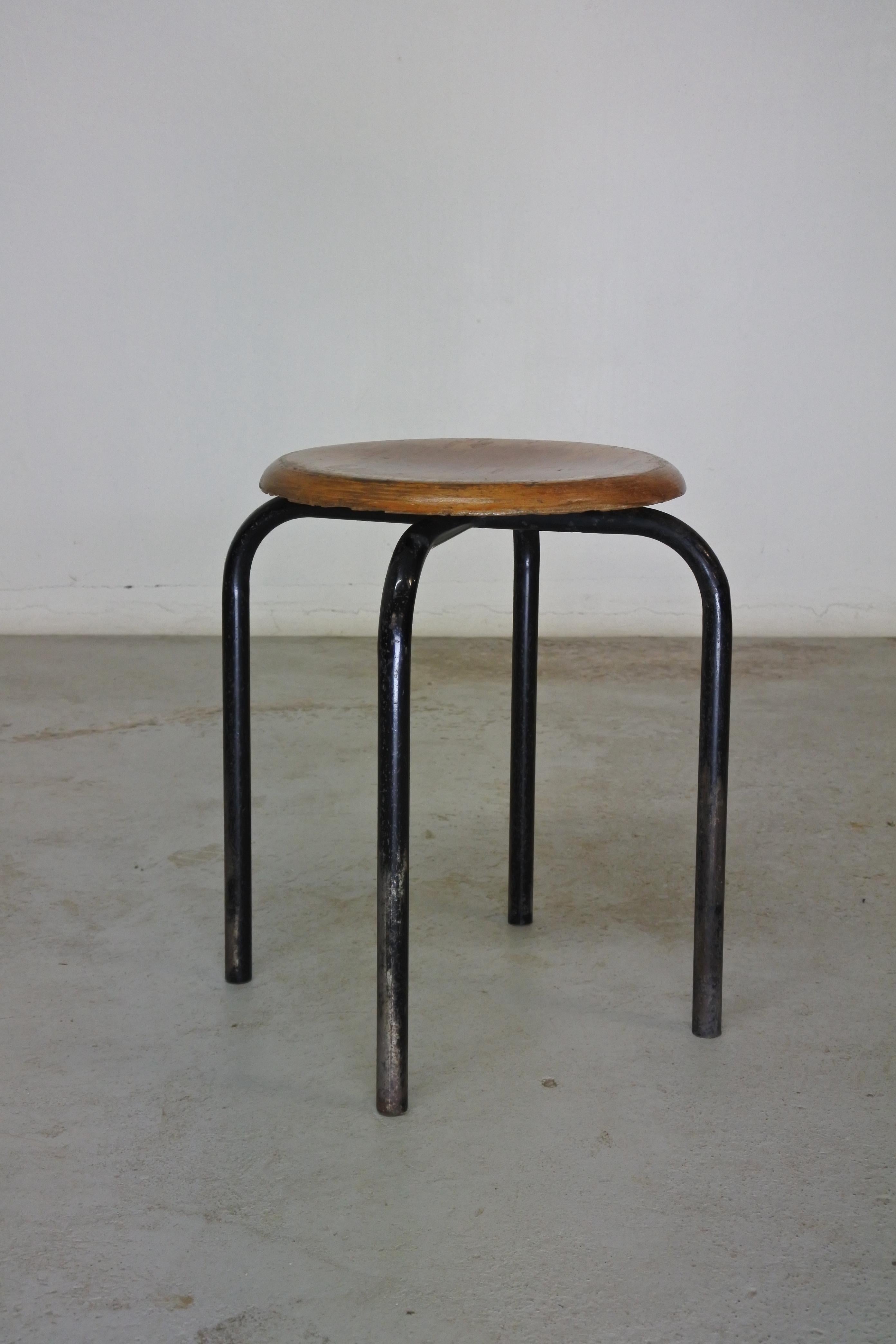 Four legged stool attributed to Atelier Jean Prouve
Lacquered metal base and moulded plywood seat.
Heavy patina.