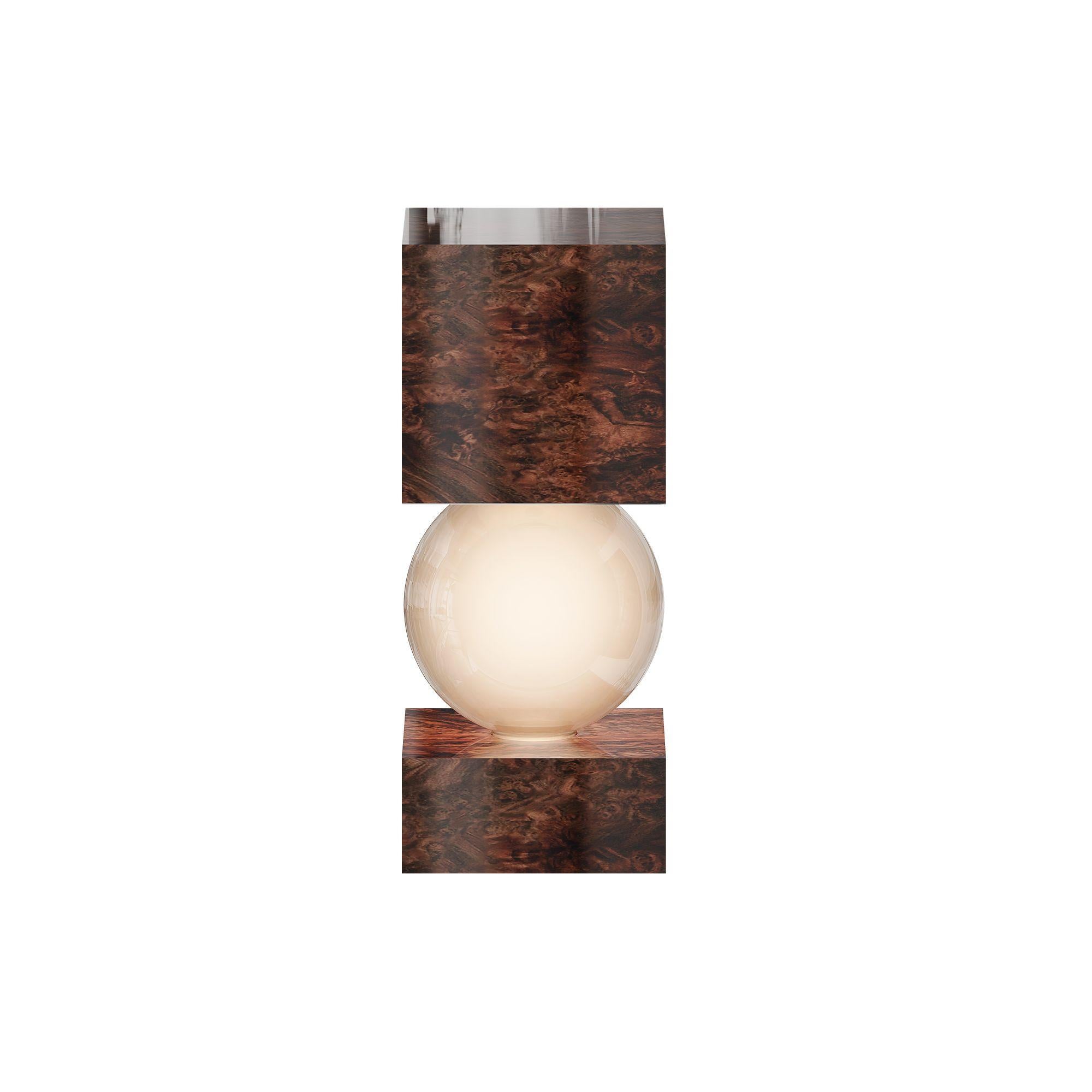 Mid-Century Modern Wood Table Lamp, Column Shape Walnut Root Frosted Glass LightThe Athena Table Lamp Wood is a testament to timeless craftsmanship, blending brutalist inspiration with contemporary design. Its solid wood base anchors a geometric