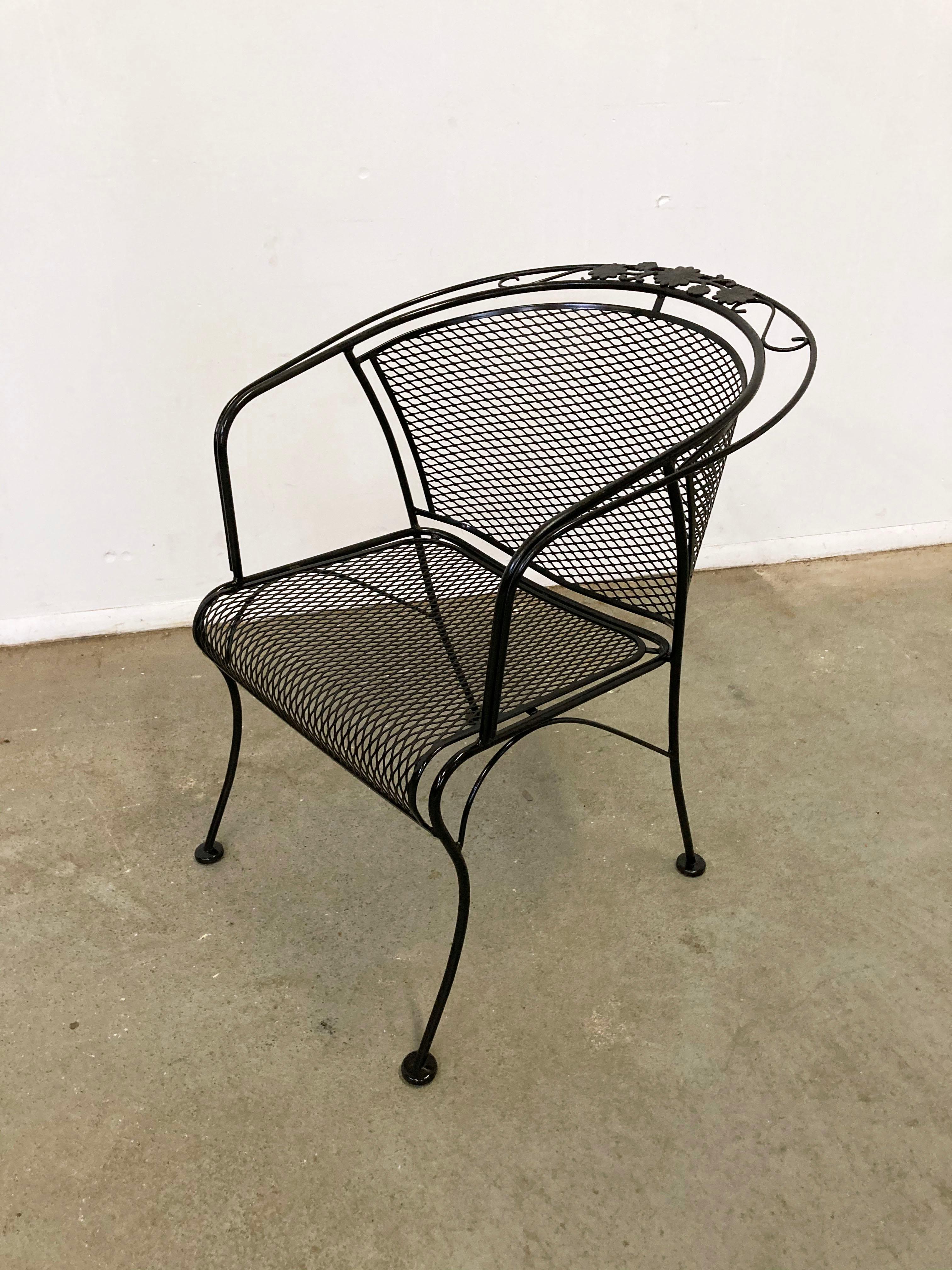 Offered is a vintage Woodard Briarwood patio chair. It has a wrought-iron frame with a mesh seat and curved legs. Features a floral design on the chair back. In good condition, structurally sound, and has been repainted. It is not
