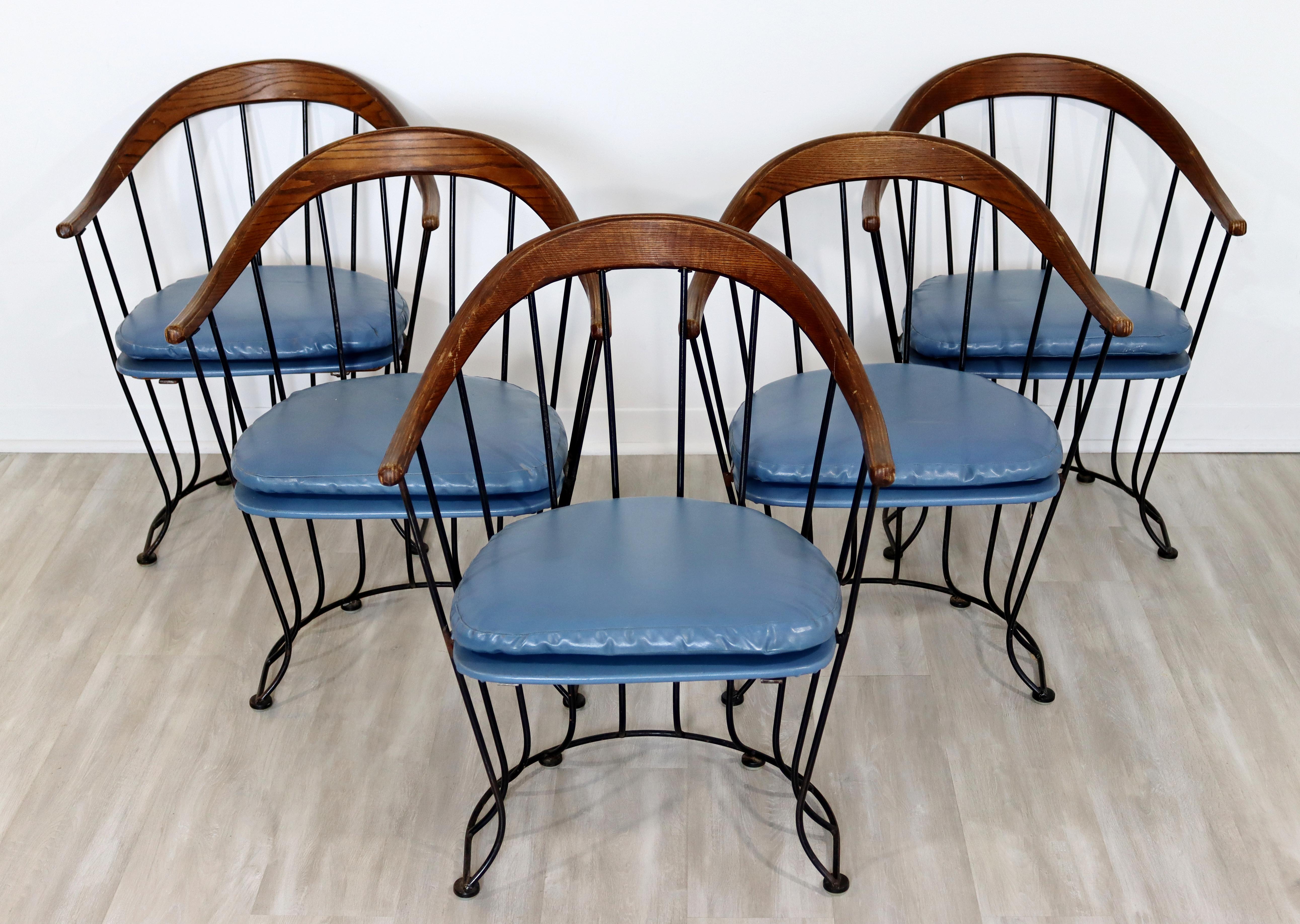 For your consideration is a brilliant, indoor/outdoor patio set of five, curved, wood topped armchairs, by Russell Woodard, circa the 1960s. In good vintage condition. The dimensions are 24