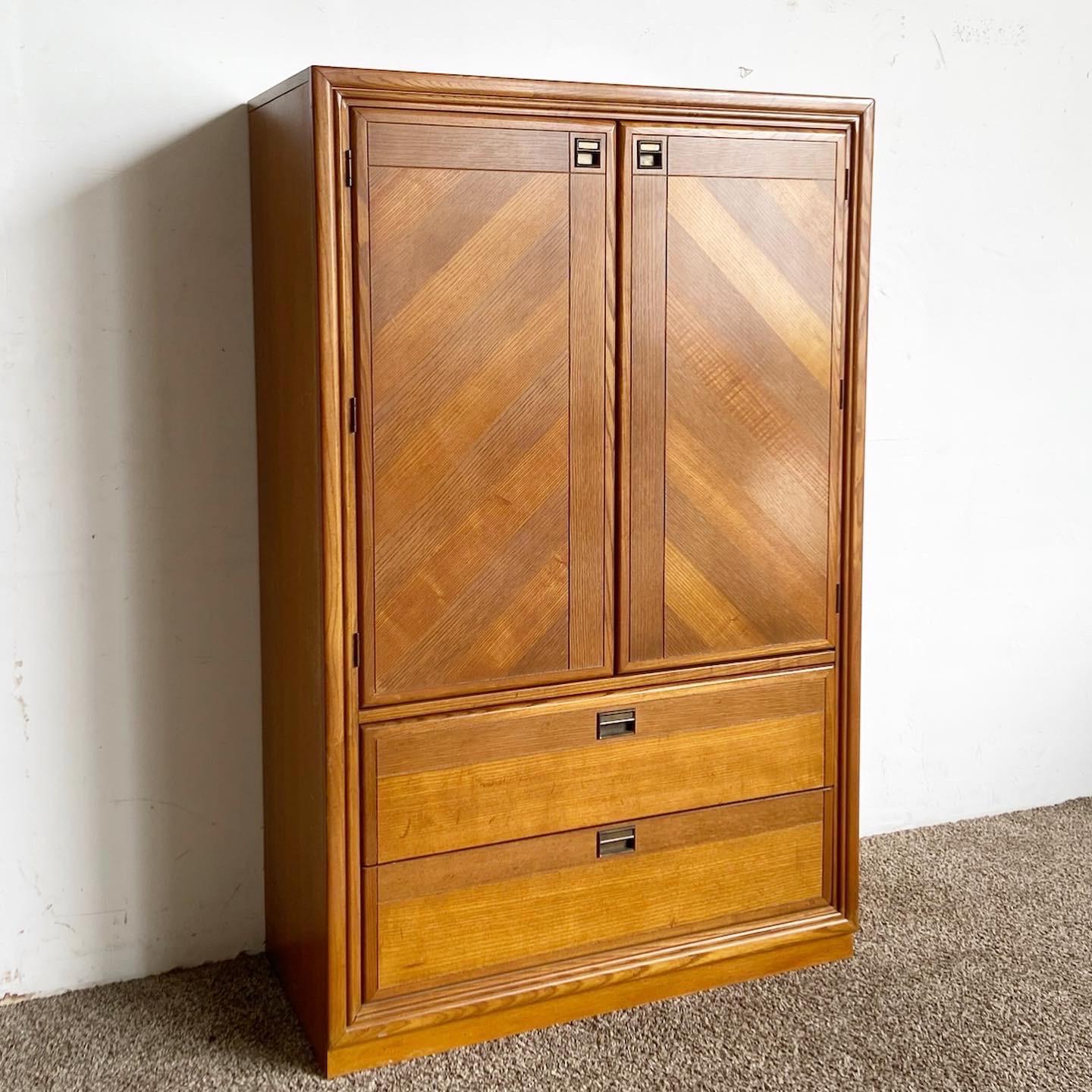 Introducing the Mid Century Modern Wooden Armoire by Bernhardt. A perfect blend of style, storage, and mid-century charm for your bedroom.

Striking doors flaunting a veneer showcasing a beautiful stripe pattern.
Ample storage space for your
