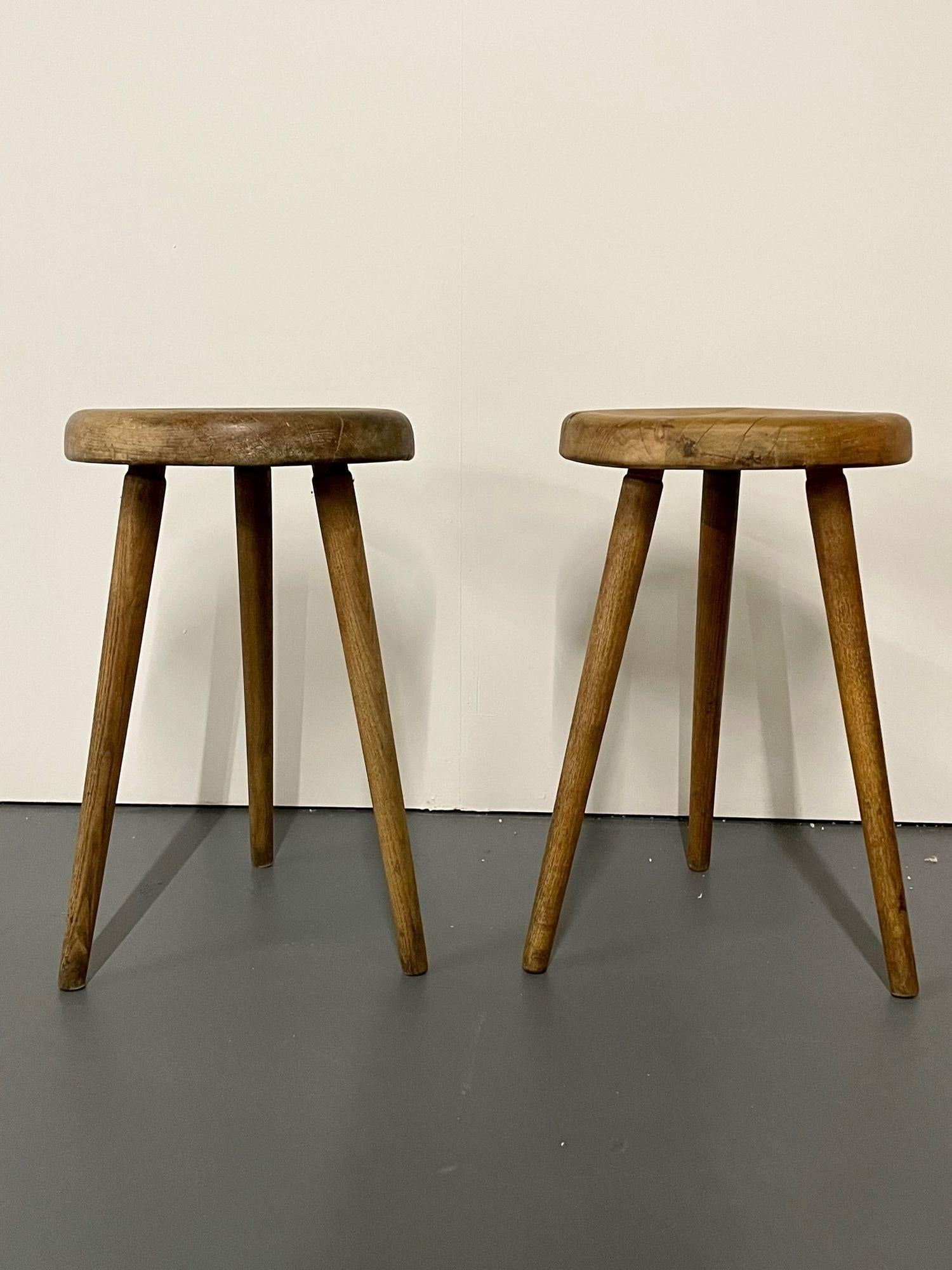 Mid-Century Modern Wooden French Provincial Stools, Charlotte Perriand Style
 
Pair of mid-century wooden stools in elm reminiscent of Charlotte Perriand's design. Perriand initially designed stools for Les Arcs ski restort in France.
 
Other