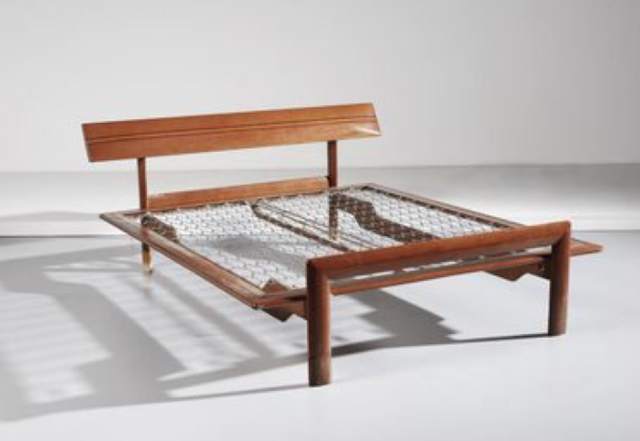 Italian wooden hand carved bed frame with metal frame made in 1967 by Eugenio Gerli for Tecno. Very good authentic condition with no restorations made.