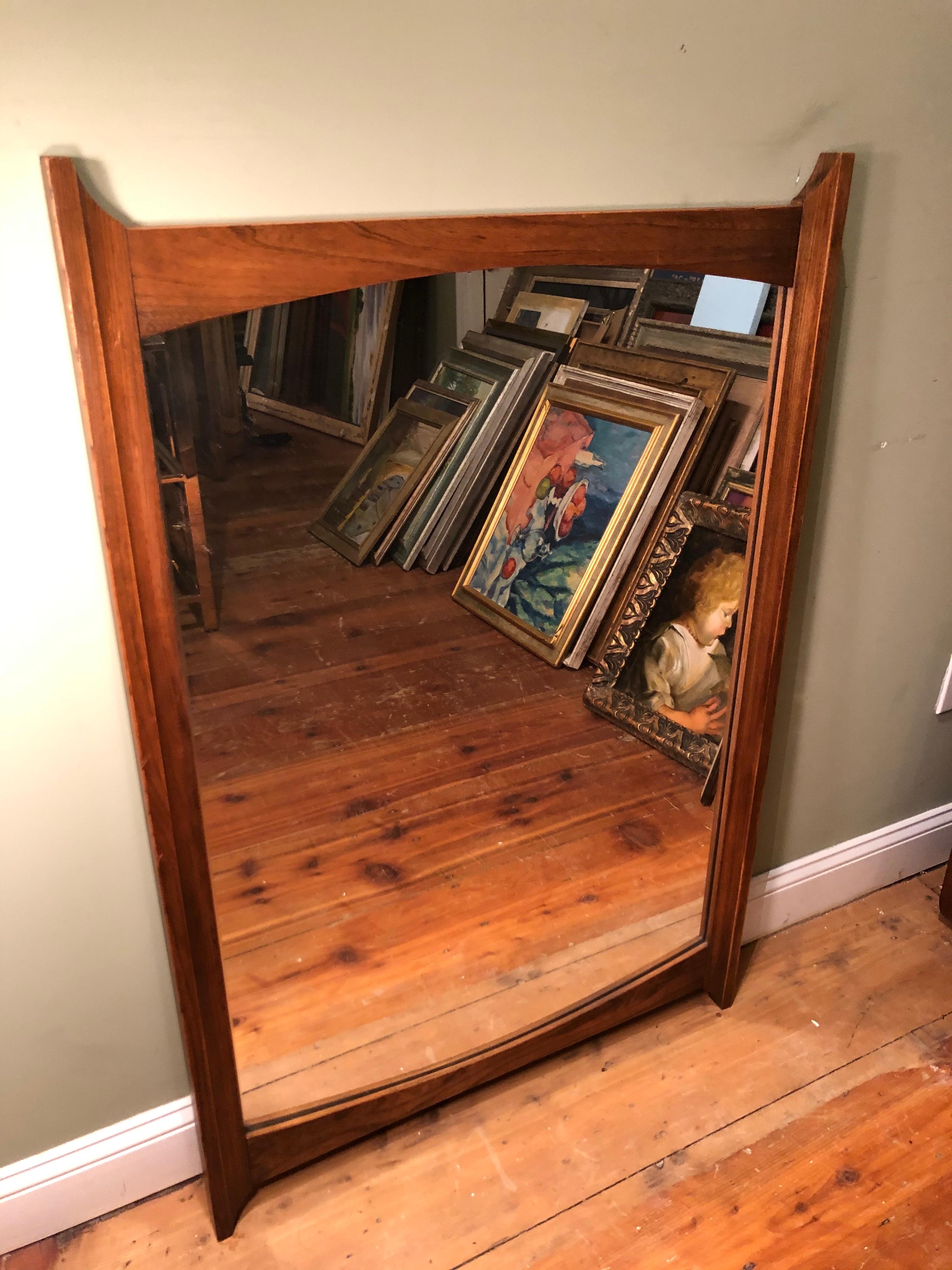 Mid-Century Modern wooden mirror in oak. Solid and well made. This item can also be hung horizontally if desired.
This item is on clearance sale as we have no wall space for it. Get a deal before it is gone. Economical dealer delivery available just