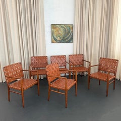 Mid-Century Modern Woven Leather Mahogany Dining Armchairs