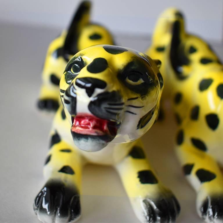 Ceramic Italian glazed leopard in yellow with black spots. Hand-painted and in excellent condition. One available. 

Measurements are:
2
