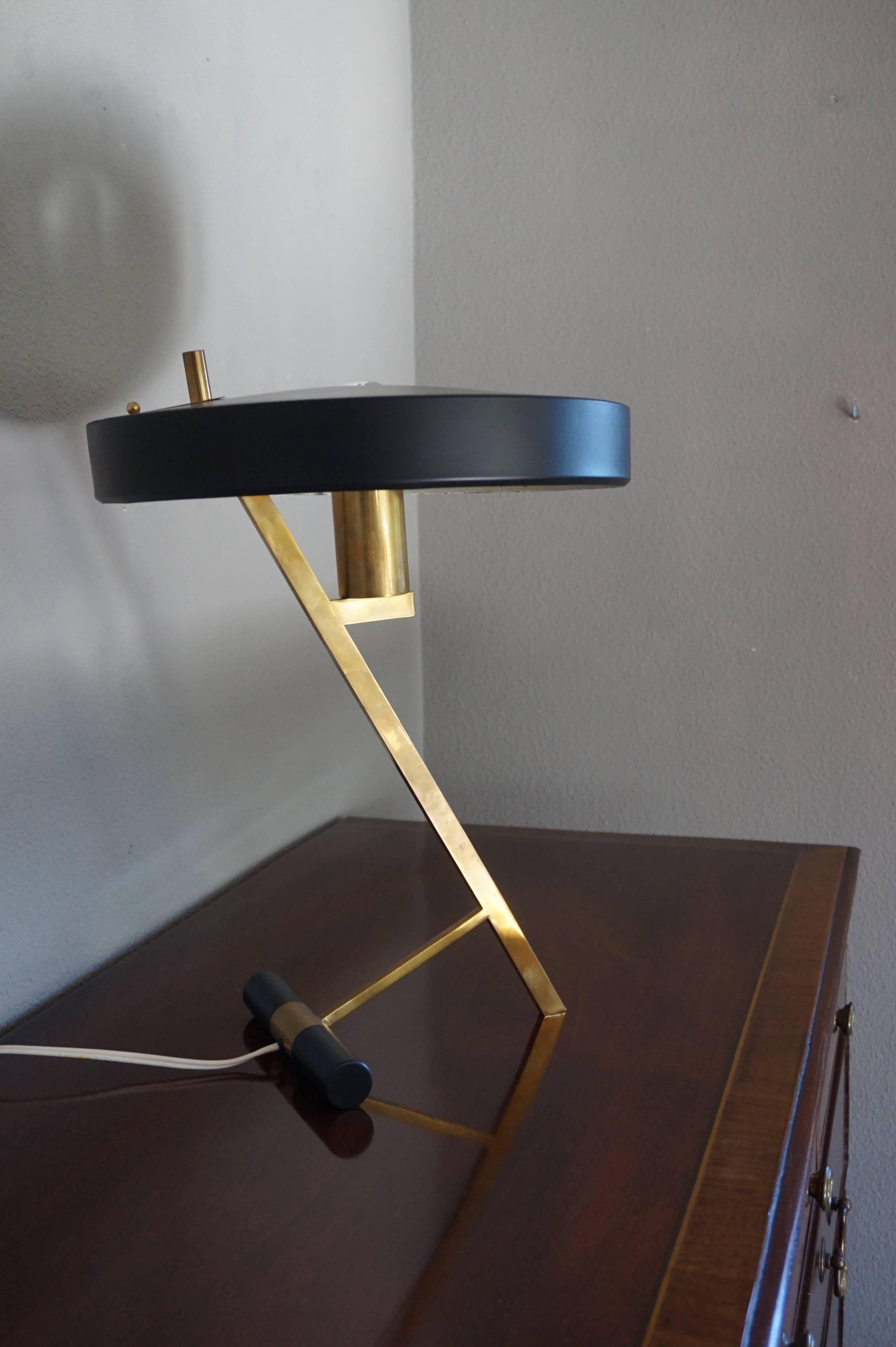 Super stylish table lamp that can be mixed with all kinds of styles.

If the quality of the make and the design is right then a piece can almost always be mixed with styles from entirely different periods. This top quality design by Louis Christaan