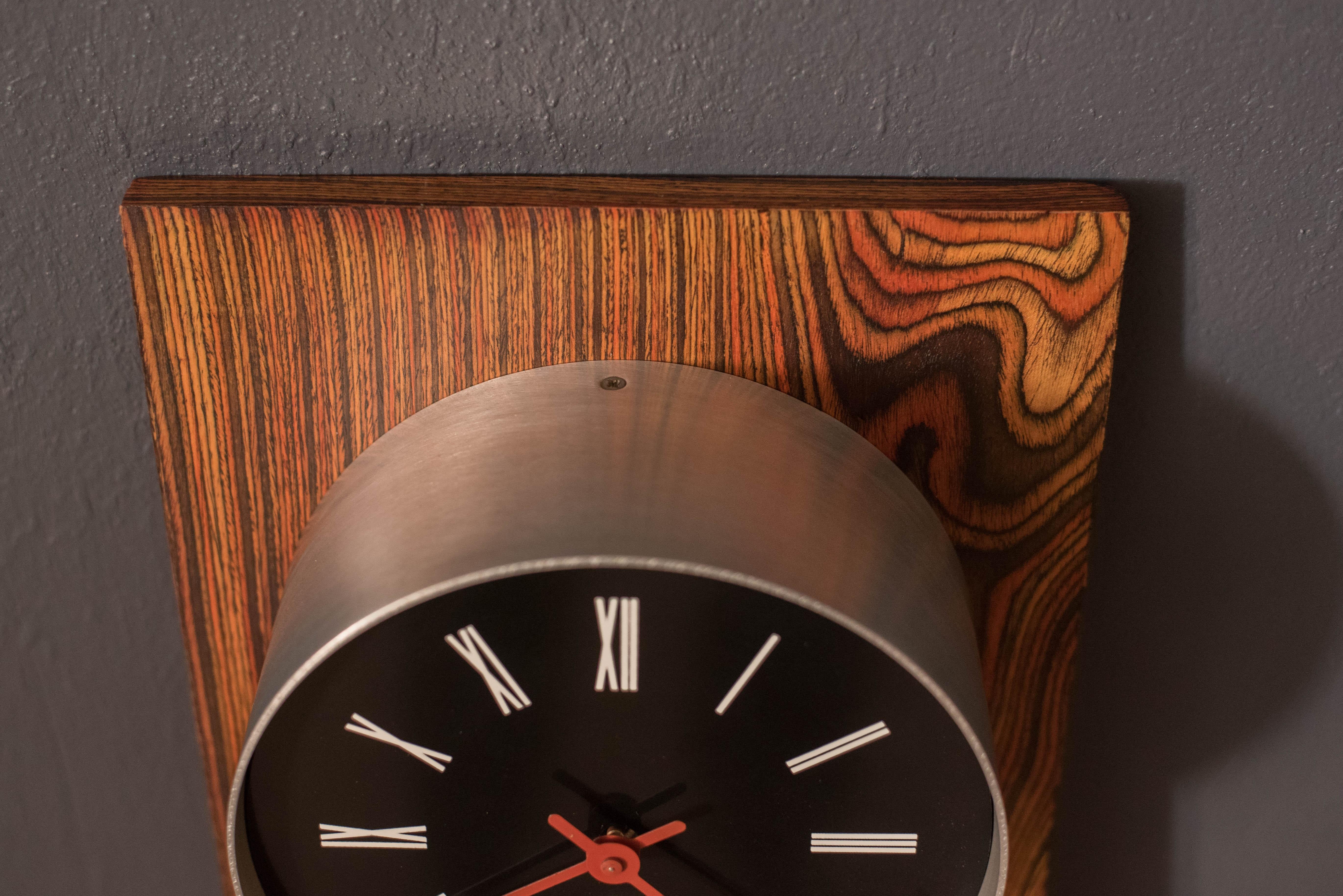 Mid Century Modern Zebrawood and Chrome Wall Clock by Howard Miller For Sale 2