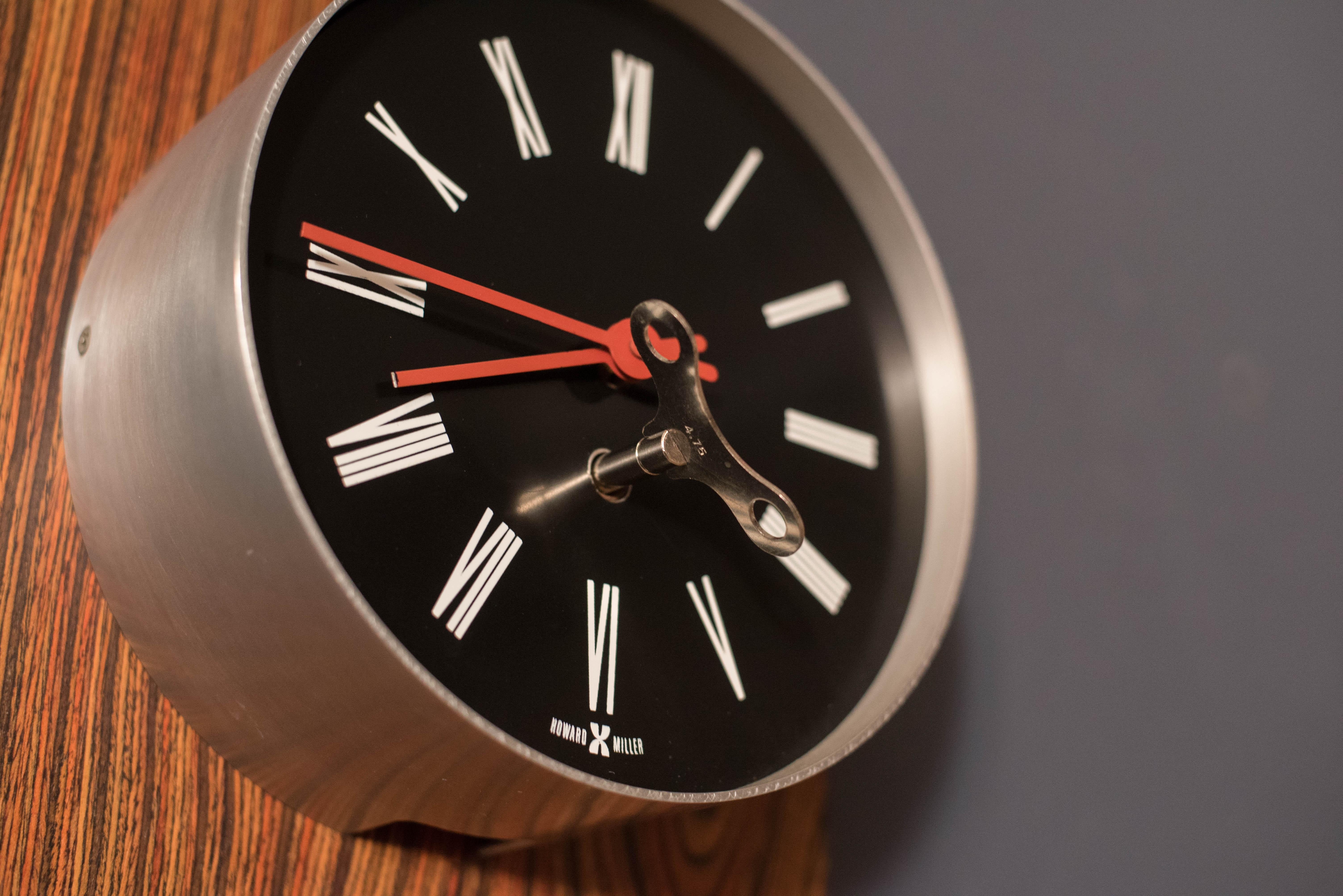 American Mid Century Modern Zebrawood and Chrome Wall Clock by Howard Miller For Sale