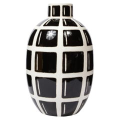 Used Mid-Century Modern Black & White Ceramic Elliptical Grid Form "Grenade" Vase