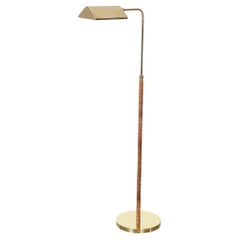 Vintage Mid-Century Modernist Articulating Polished Brass and Ratan Wrapped Floor Lamp