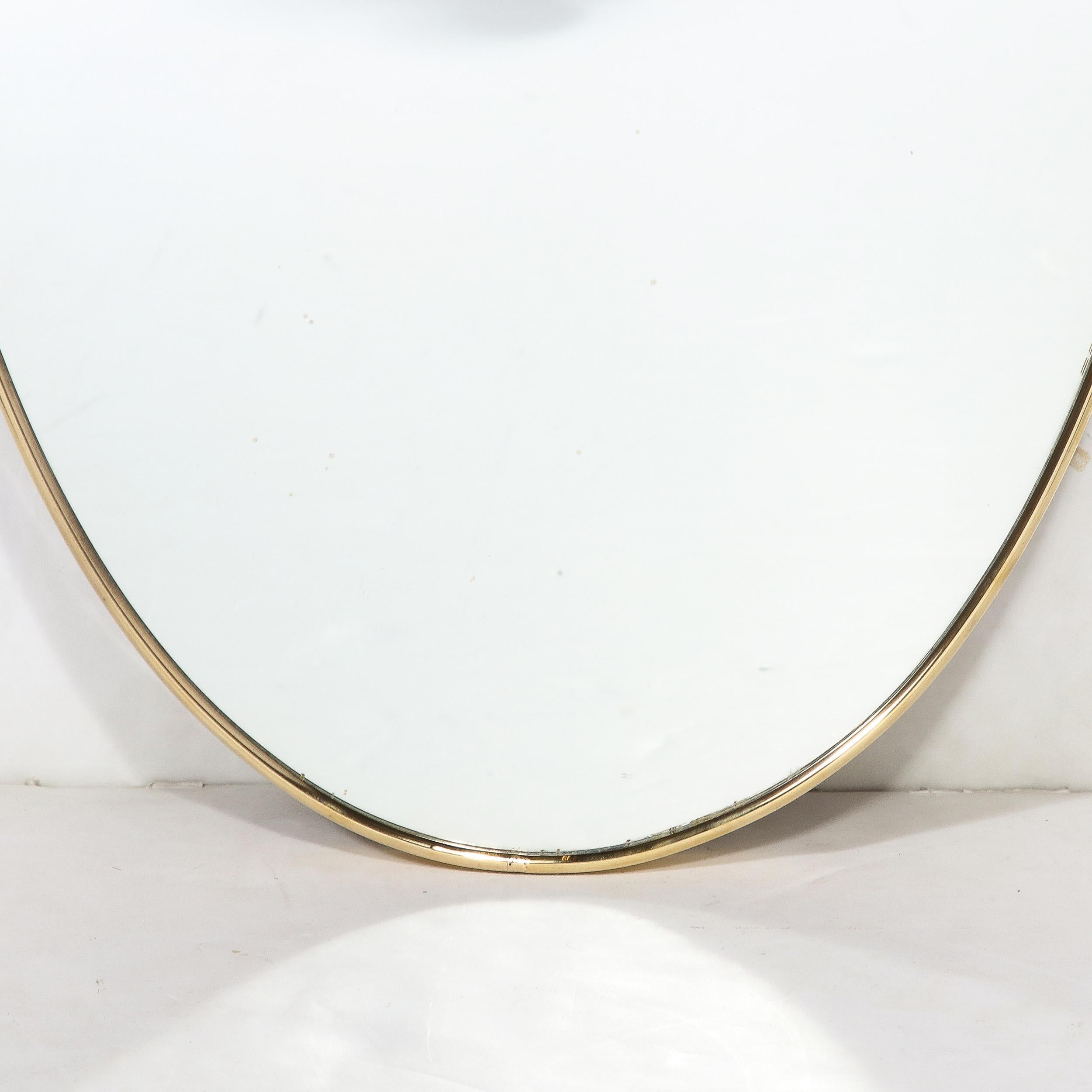 Mid-Century Modernist Brass Wrapped Shield Form Mirror In Excellent Condition For Sale In New York, NY