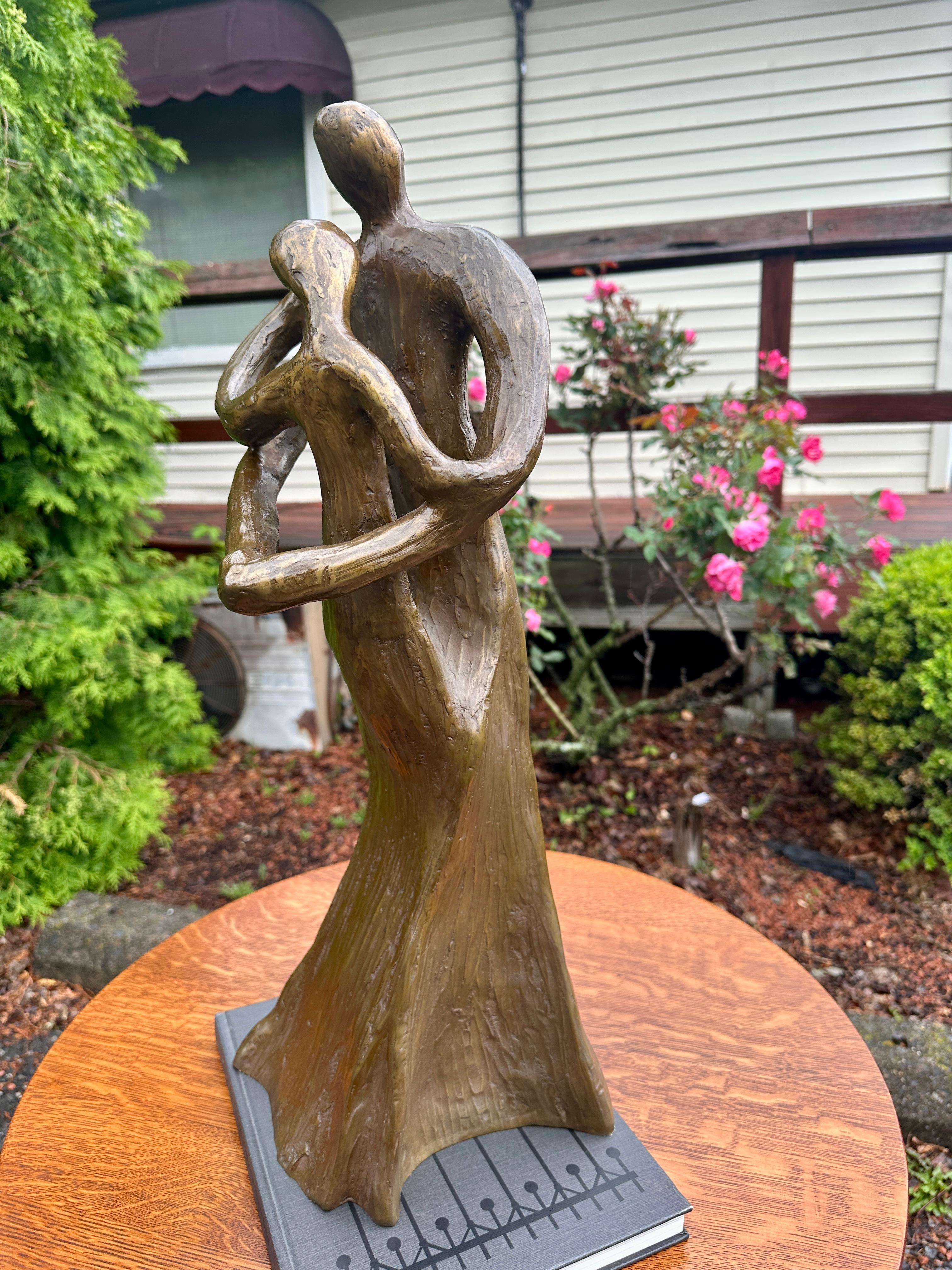 Mid-Century Modernist Bronze of Mother and Child - W8391

This is a beautiful vintage bronze of a mother and child (or could be a man and woman).  It came from a local estate.