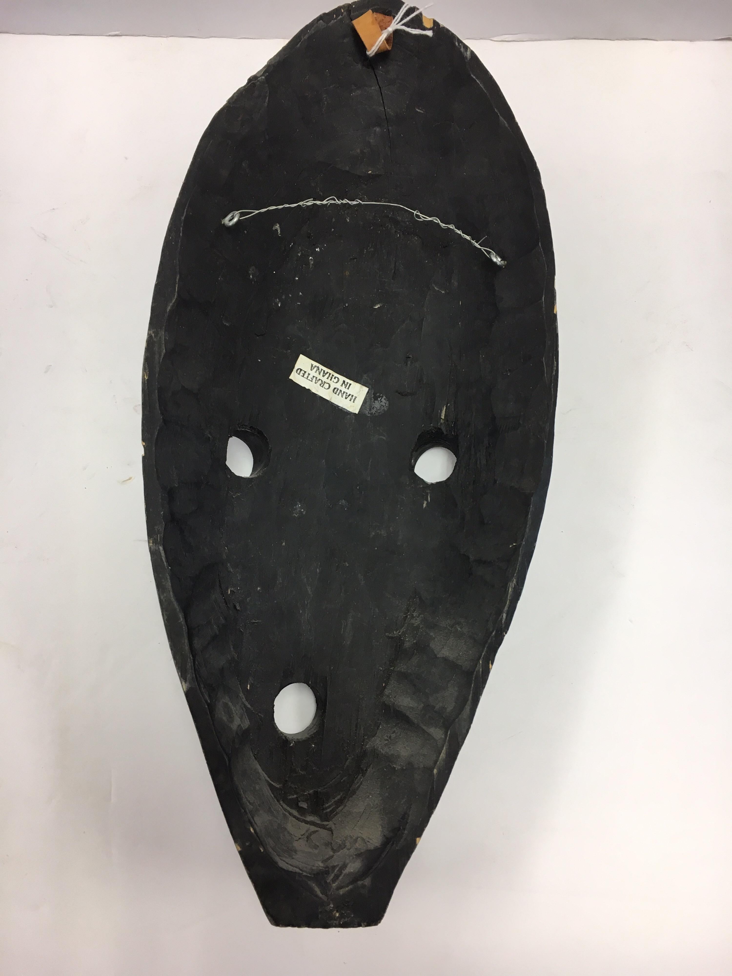 Mid-Century Modernist Decorative African Hanging Mask Sculpture Ghana In Excellent Condition In West Hartford, CT