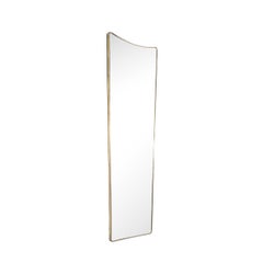 Mid-Century Modernist Elongated Brass Wrapped Mirror with Curved Top Detailing