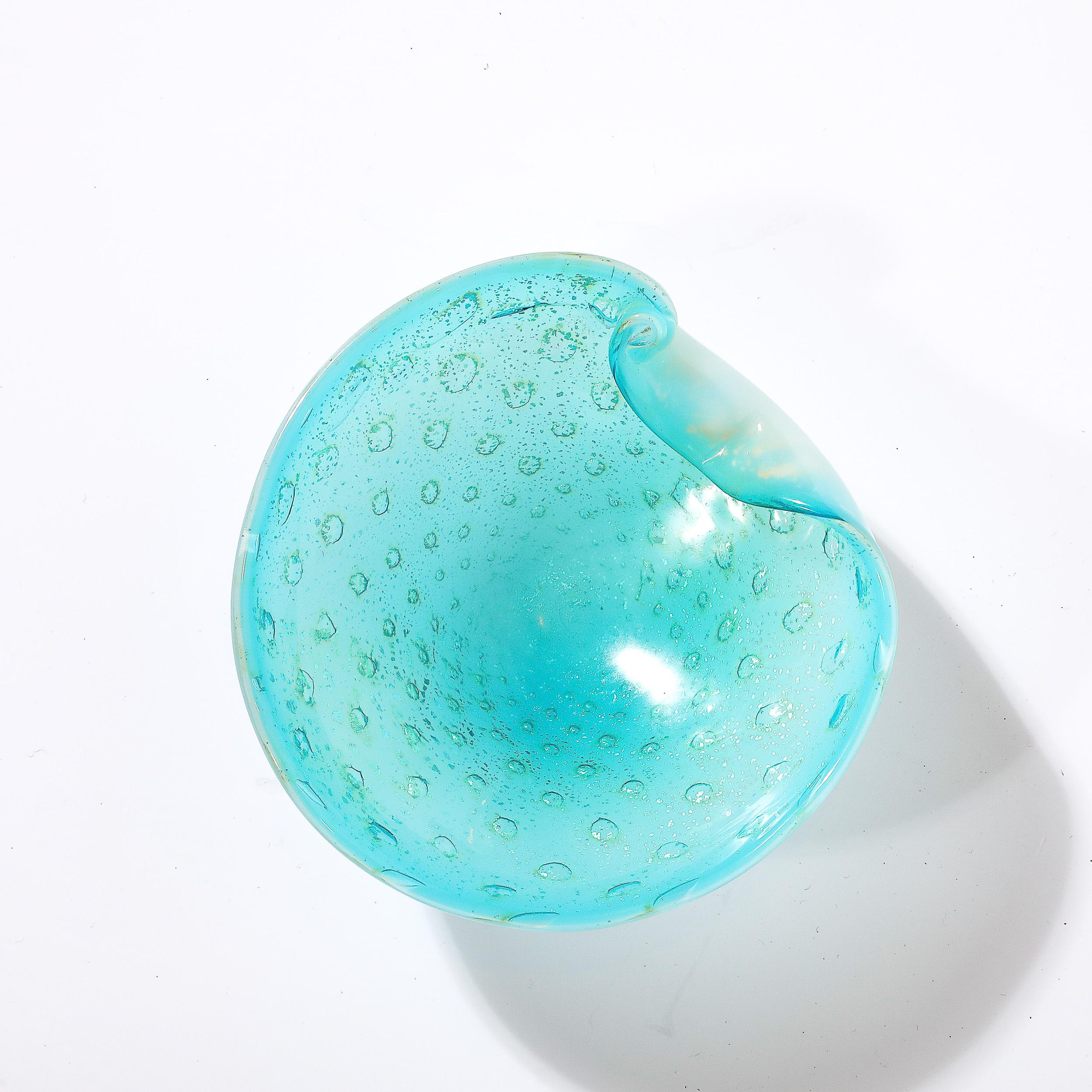 This serene and elegant Mid-Century Modernist Hand-Blown Murano Glass Dish with Curved Lip in Aquamarine and White originates from Italy, Circa 1960. Features a subtle composition with a curved element bending gently over the surface of the dish,