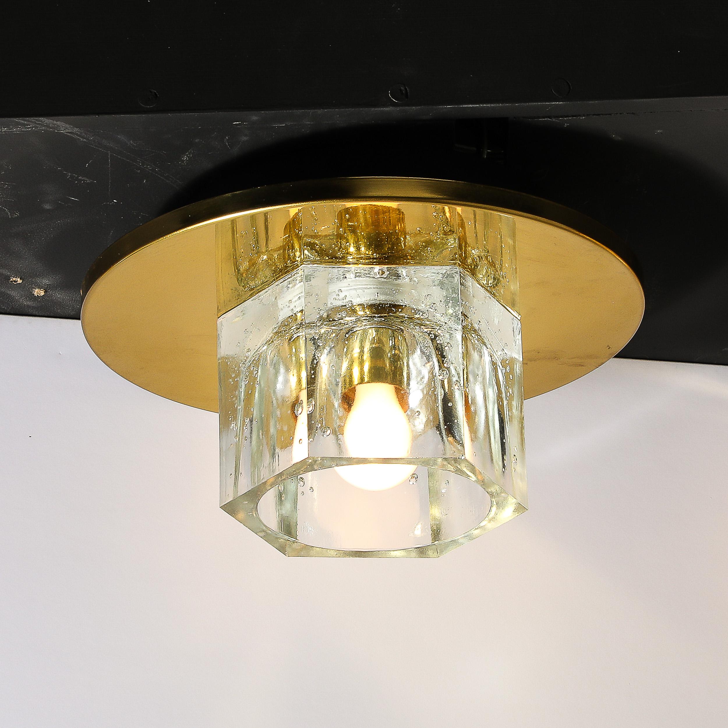 This lovely Mid-Century Modernist Hexagonal Shade Glass Flush Mount Chandelier W/Brass Fittings is by Lightolier and originates from the United States, Circa 1970. Features a hexagonal glass shade which house and diffuse the light of the bulb,