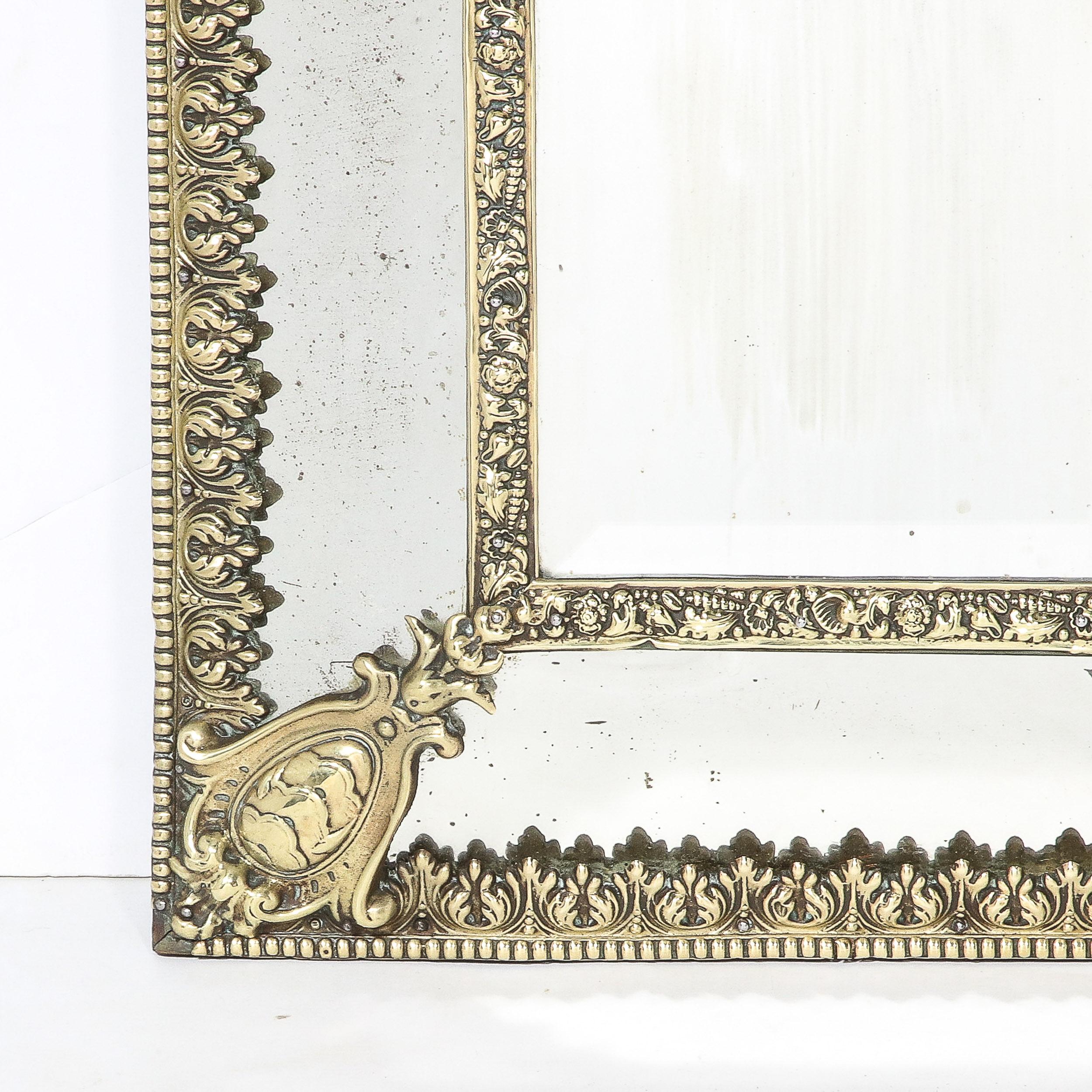 Mid-Century Modernist Hollywood Regency Gilt Reposse Antiqued Mirror In Excellent Condition In New York, NY