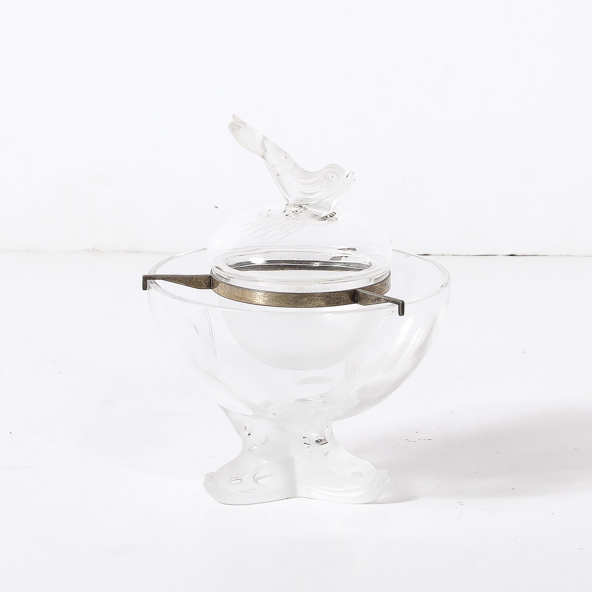 This Mid-Century Modernist caviar serving bowl by Lalique, featuring the signature 'Igor' pattern, epitomizes the refined elegance for which the French glassmaker is renowned. Crafted circa 1980, it artfully combines form and function, showcasing