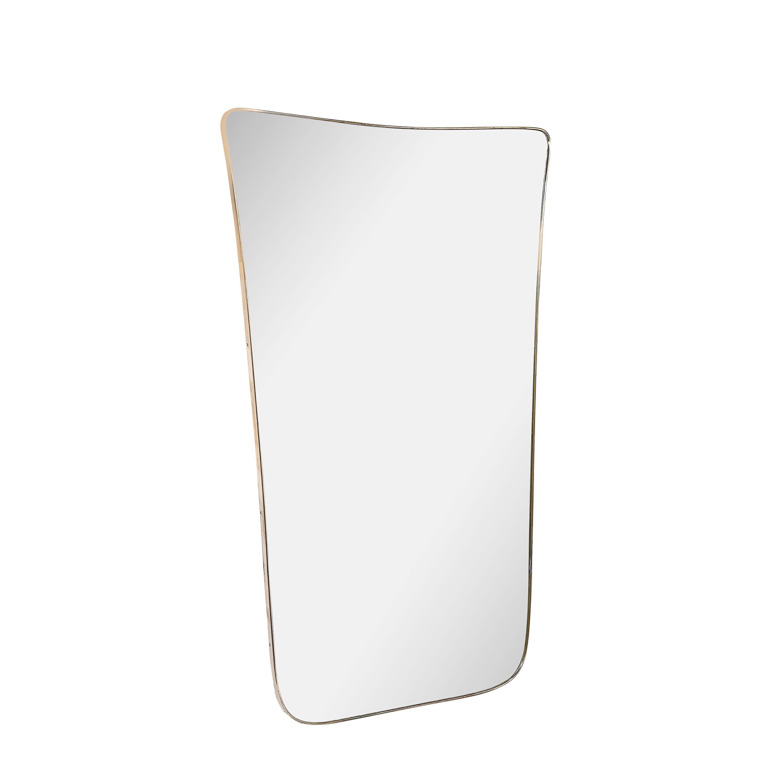 This minimal and beautifully made Mid-Century Modernist Large Tapered Brass Wrapped Mirror originates from Italy, Circa 1960. Features a stunning tapered silhouette with rounded top corners and a beautifully tapered sides with a flat lower edge.