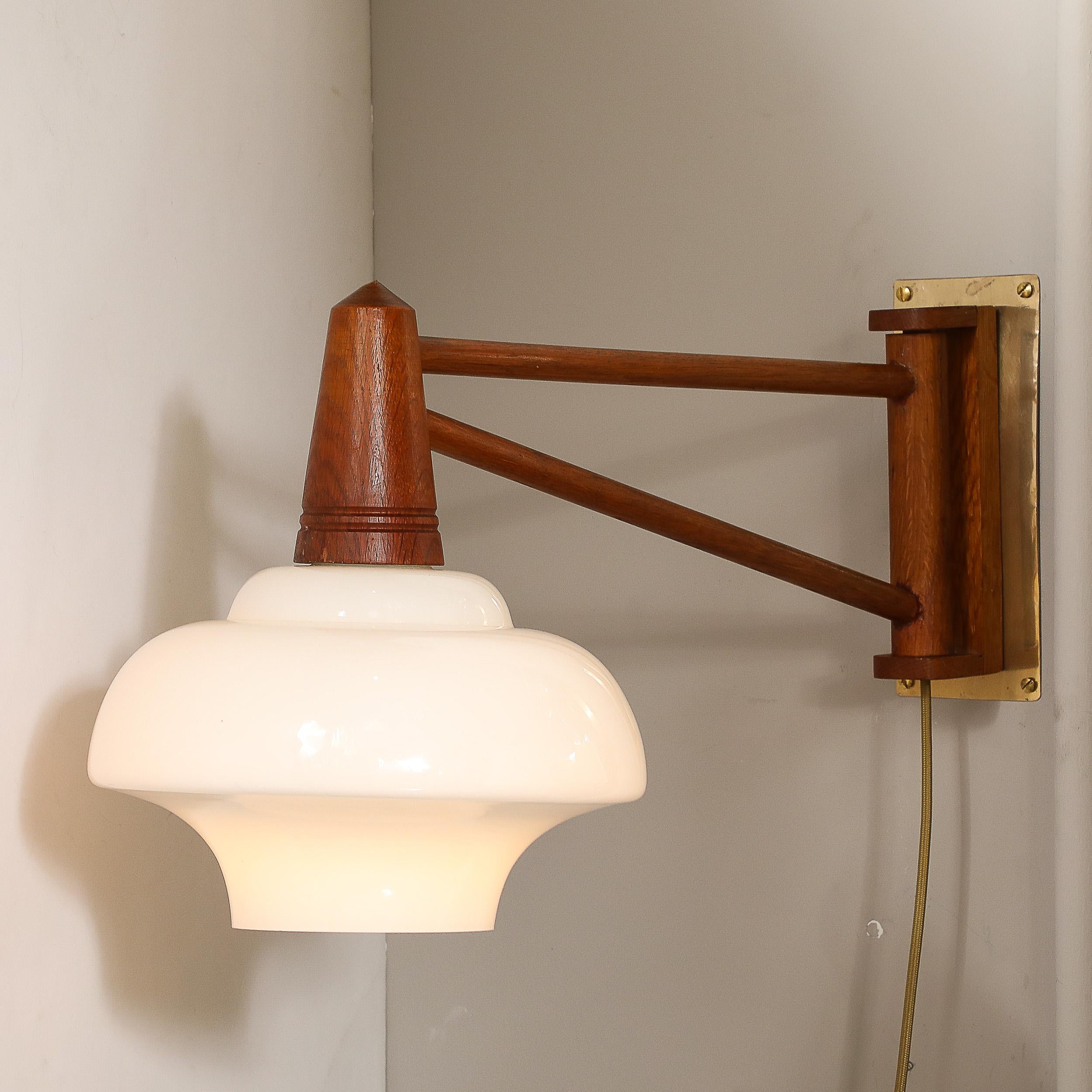 Mid-Century Modernist Milk Glass & Teak Swing Arm Wall Sconce W/ Brass Fittings In Excellent Condition For Sale In New York, NY