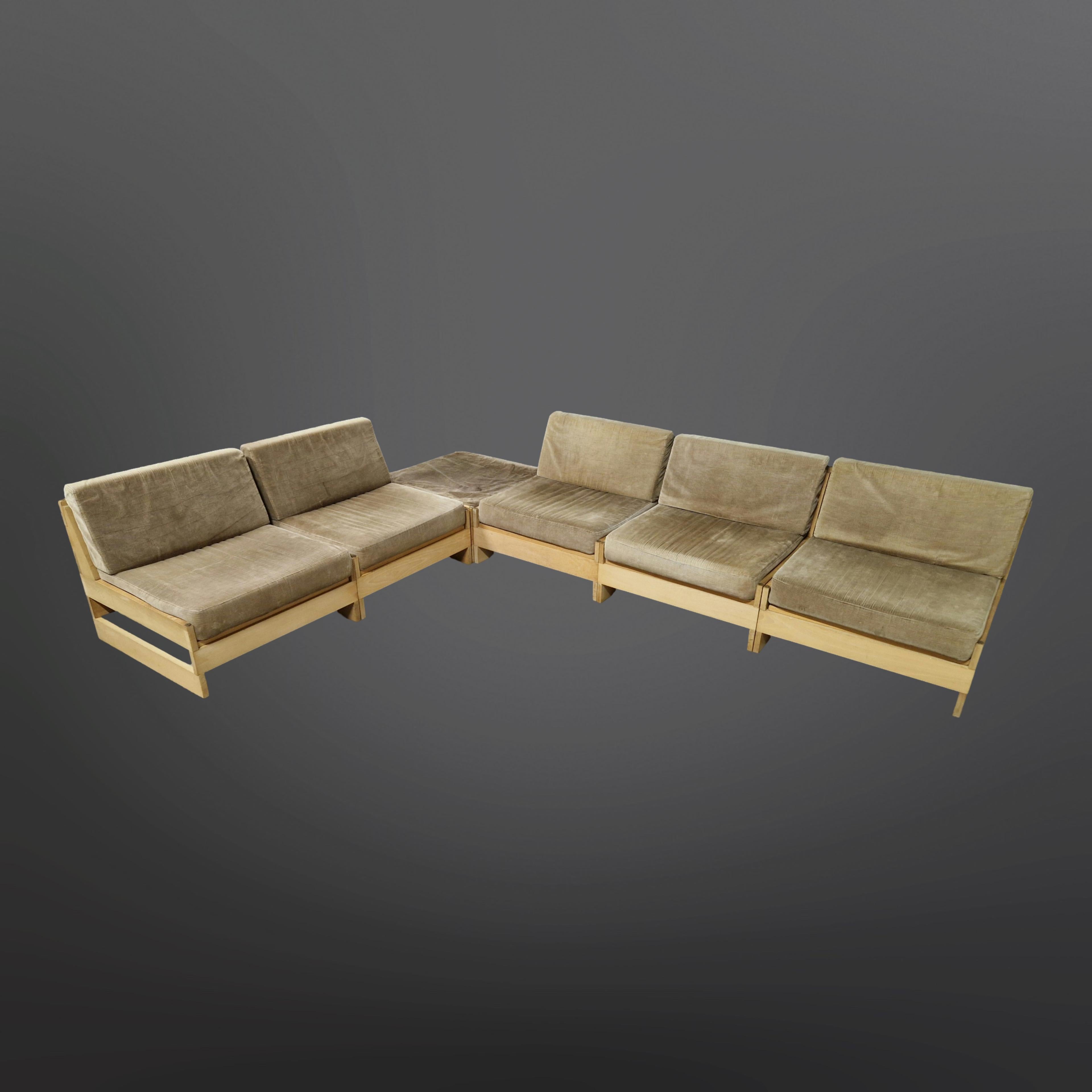 Mid century seating group. Made from solid beech with ribcord upholstery. The frames are made from slats of wood connected by a threaded rods that go through the wood and are fixed with brass hex nuts. It can be placed in different configurations
