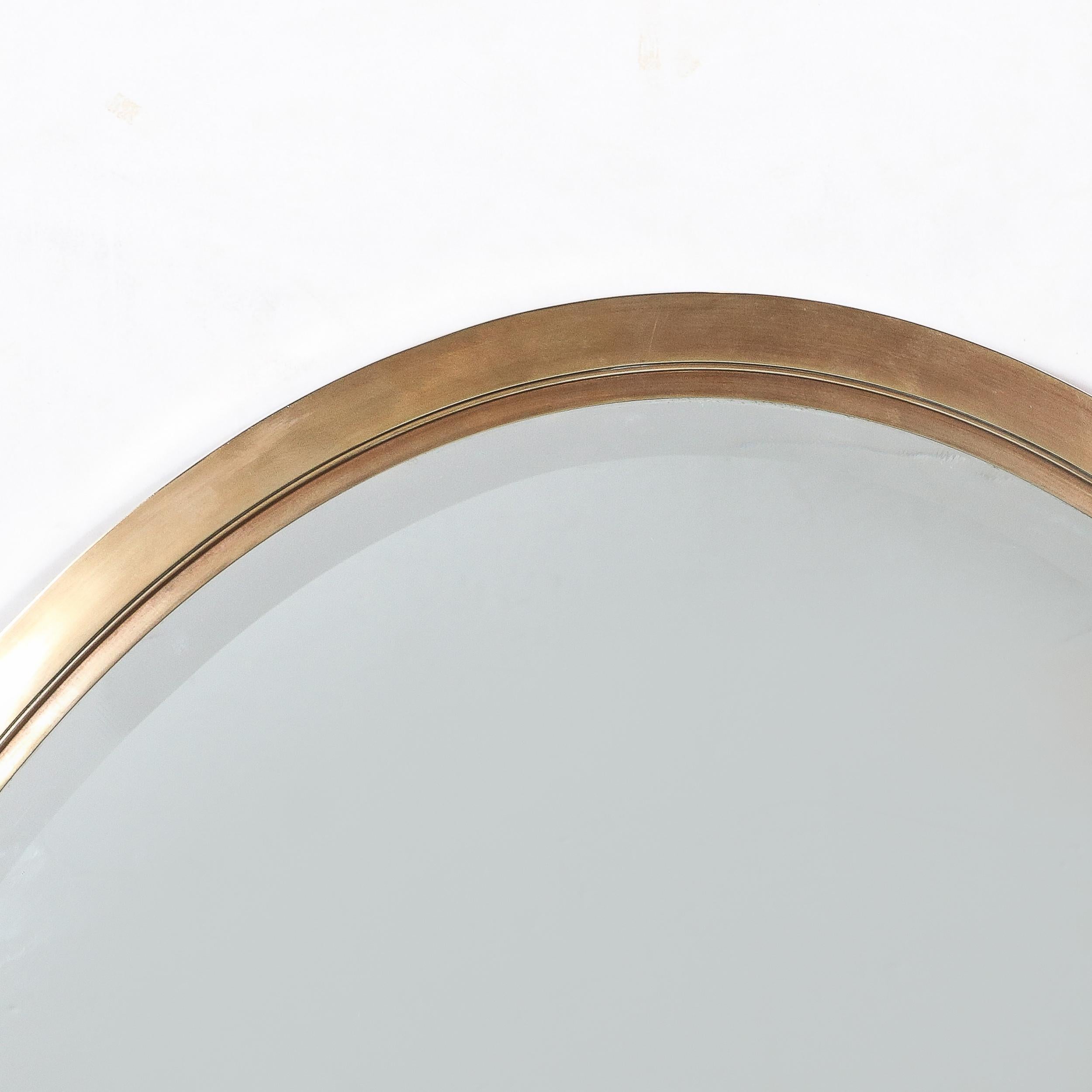 American Mid-Century Modernist Oval Mirror with Polished Brass Frame For Sale
