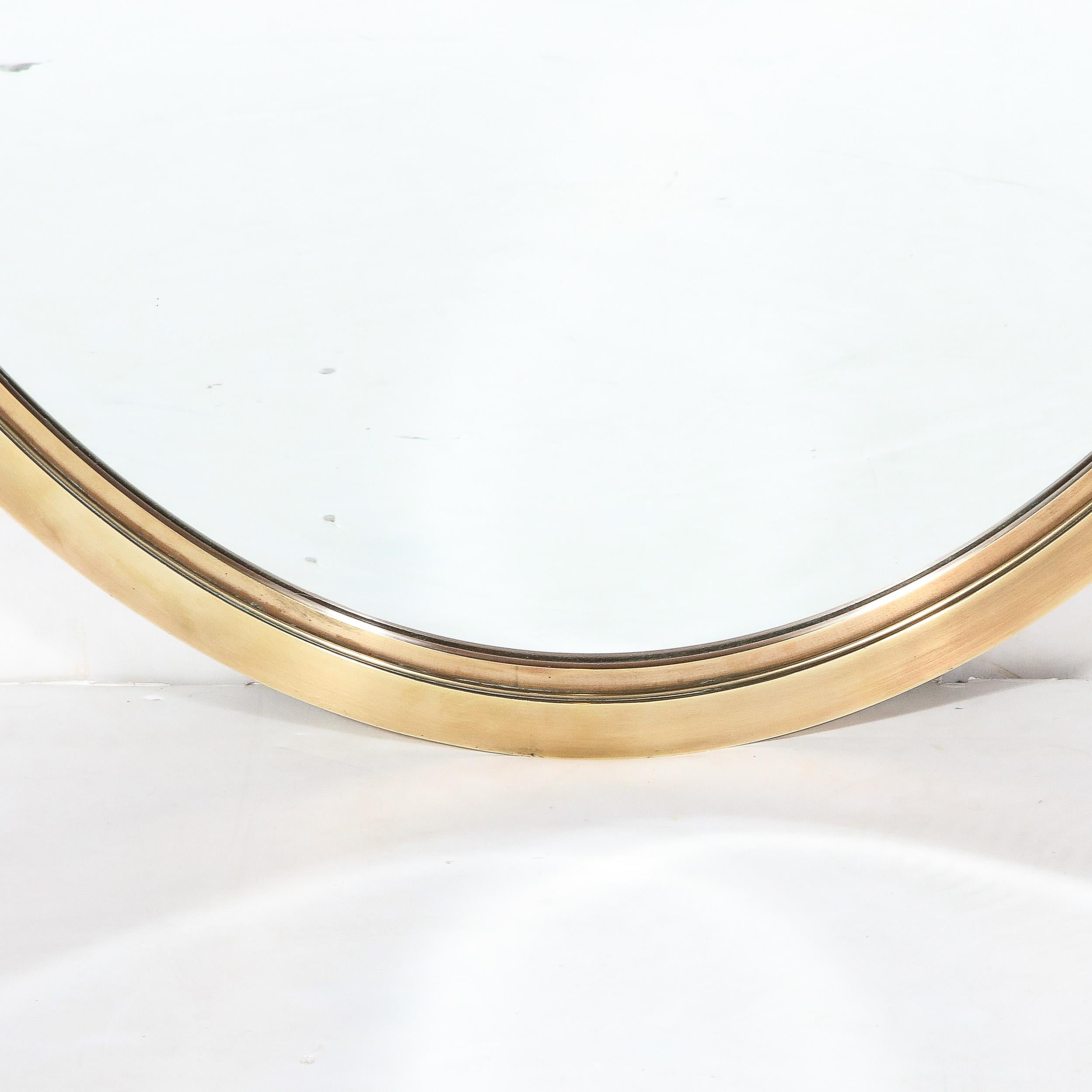Mid-20th Century Mid-Century Modernist Oval Mirror with Polished Brass Frame For Sale