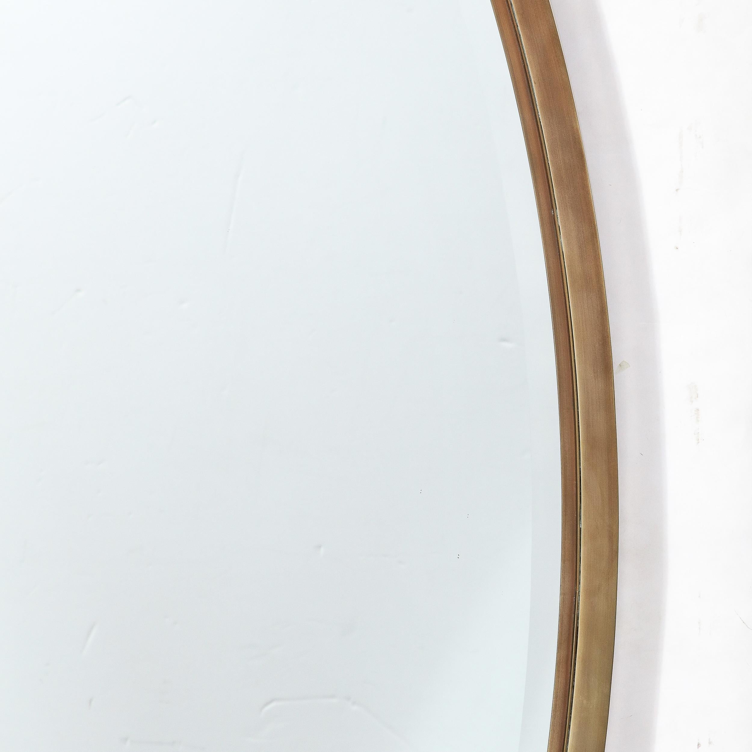 Mid-Century Modernist Oval Mirror with Polished Brass Frame For Sale 1