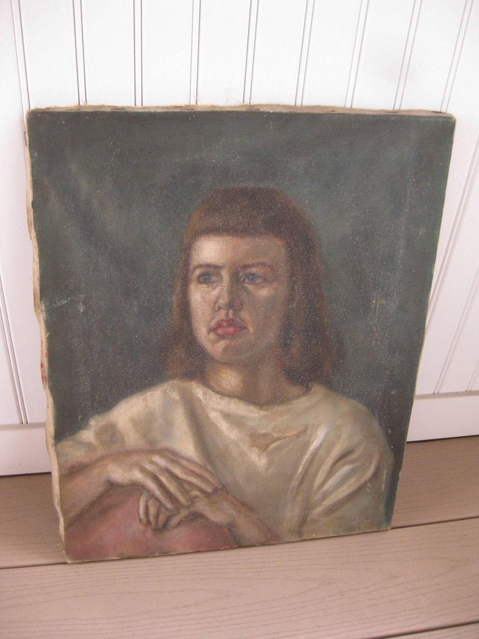 A modernist oil painting of a young woman. This mid century portrait in a modernist style is an amazing find.
The female portrait is a finely executed oil on canvas.
The mid century painting has the expected wear of a vintage oil painting, but it