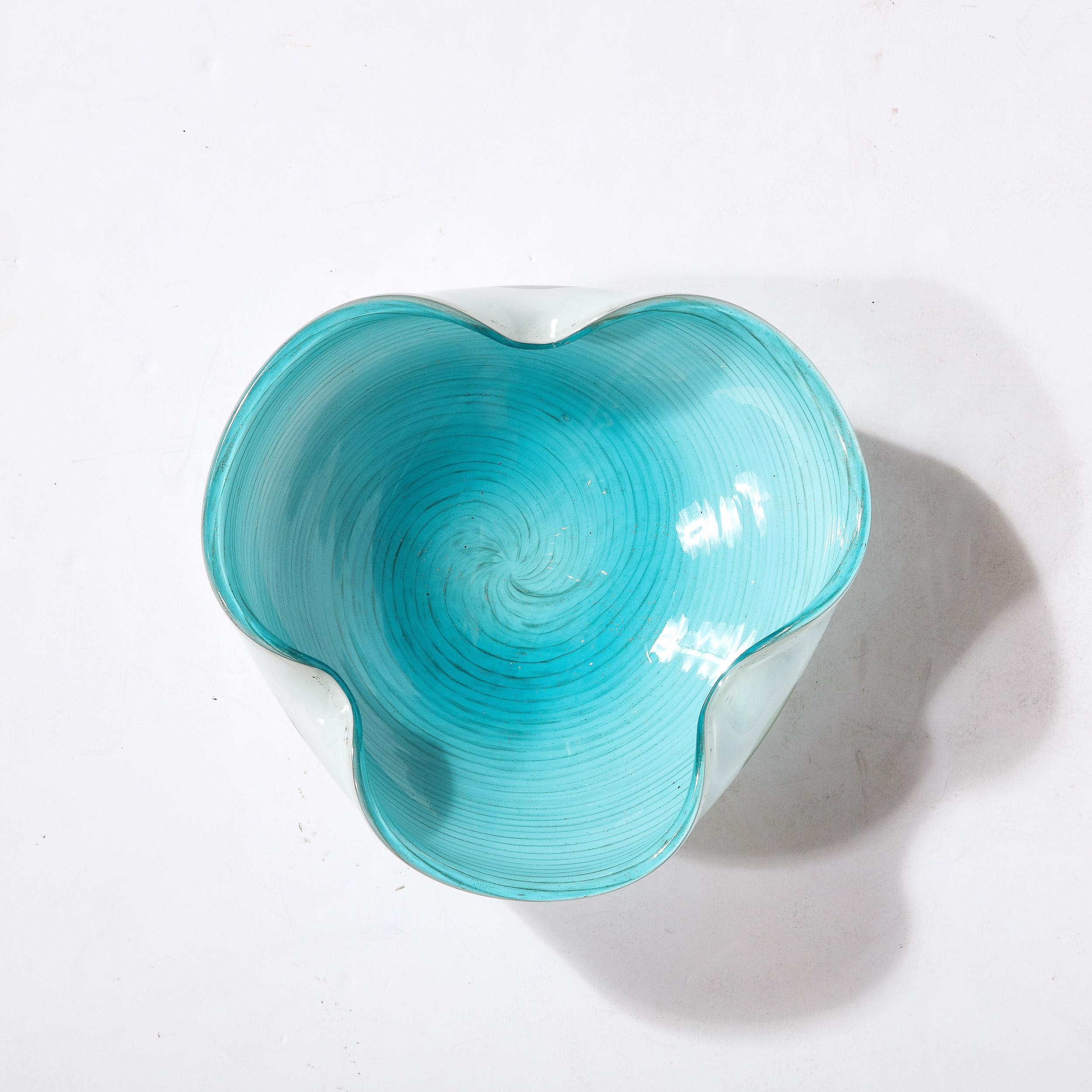 This Mid-Century Modernist Hand-Blown Murano Glass Dish originates from Italy, Circa 1950. A beautiful example of the Murano Art Glass tradition, this piece is elegantly made and utilizes the material complexity inherent in blown glass with its
