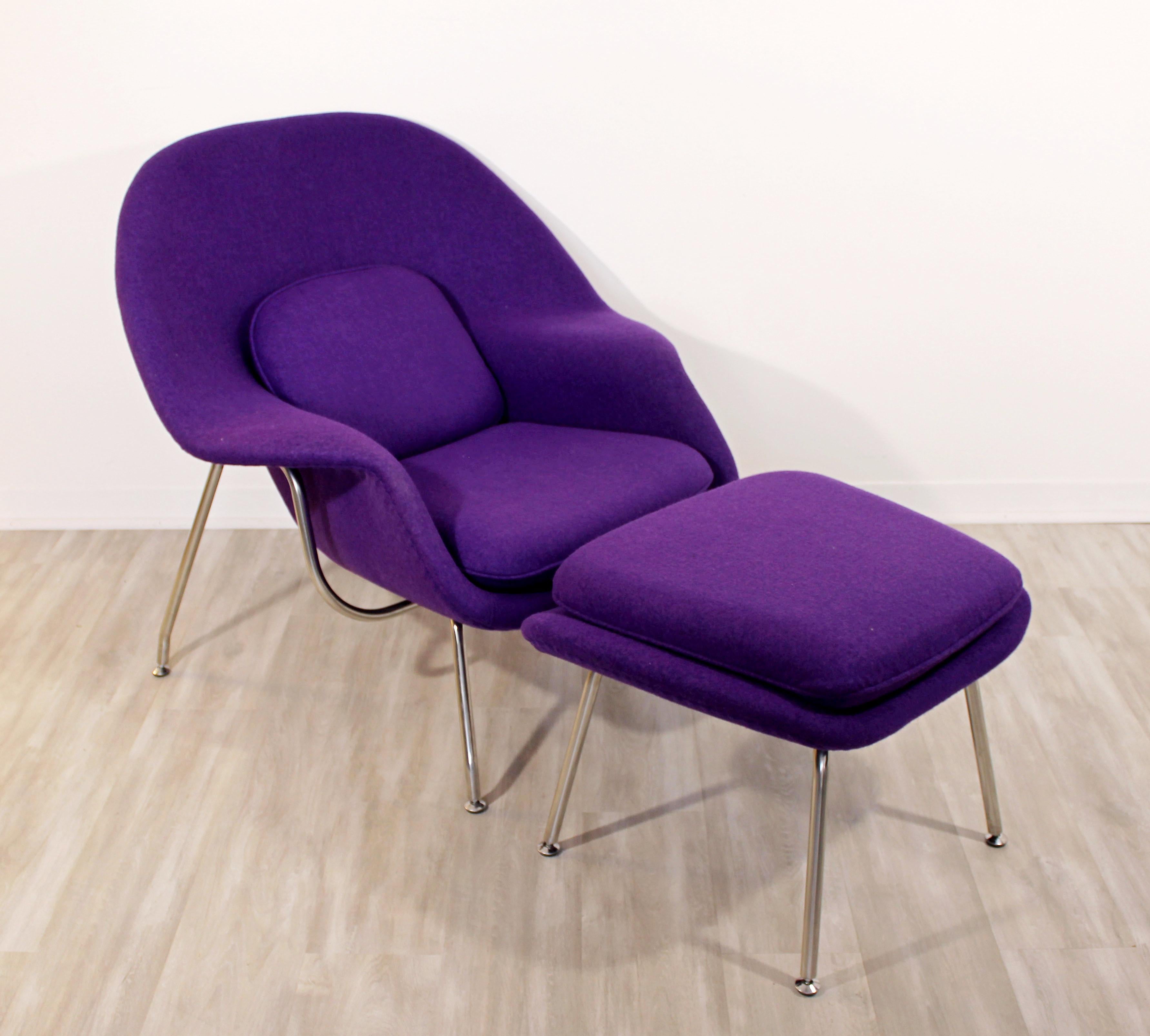 For your consideration is a fabulous, purple womb chair and matching ottoman, in the style of Eero Saarinen for Knoll. Newer production. In excellent condition. The dimensions of the chair are 37