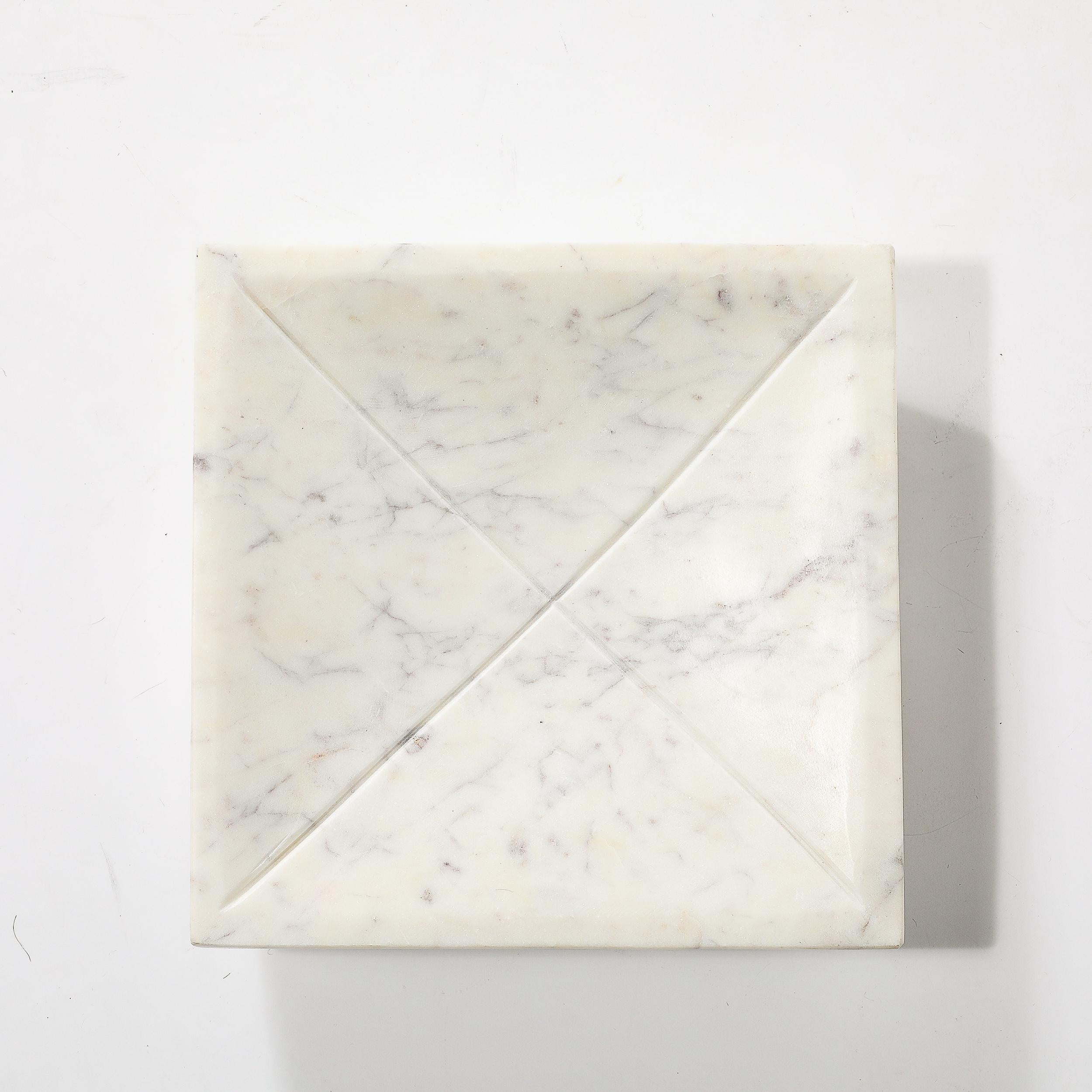 Introduce a touch of elegance to your decor with the Mid-Century Modernist Rectilinear Carved Marble Tray, crafted in America circa 1960. This piece exemplifies the refined simplicity and timeless style characteristic of mid-century modern