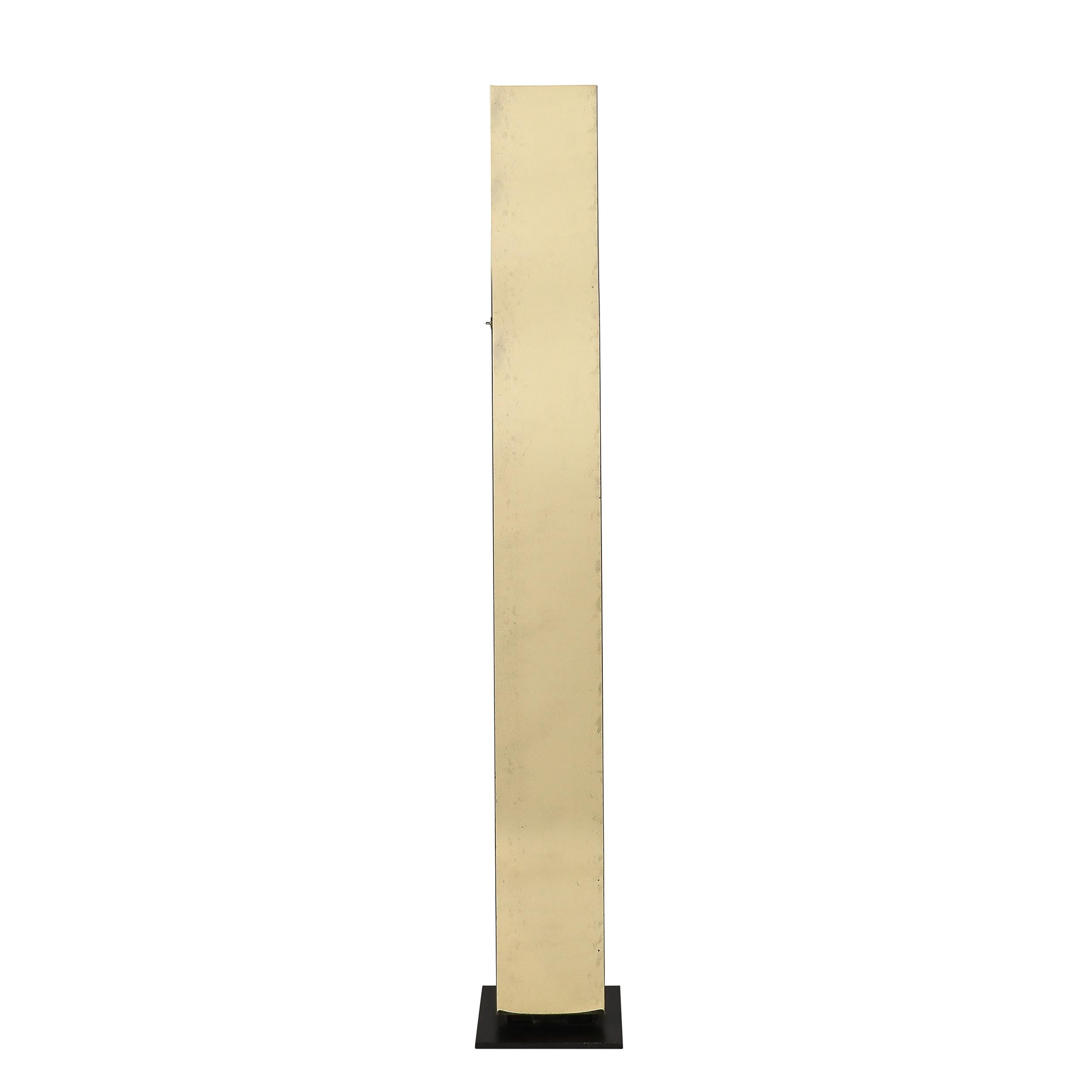 This striking and well proportioned Mid-Century Modernist Rectilinear Floor Lamp in Brass & Black Enamel originates from Italy, Circa 1970. Features a vertical profile resting on a low profile rectilinear black enamel base, with a towering body in
