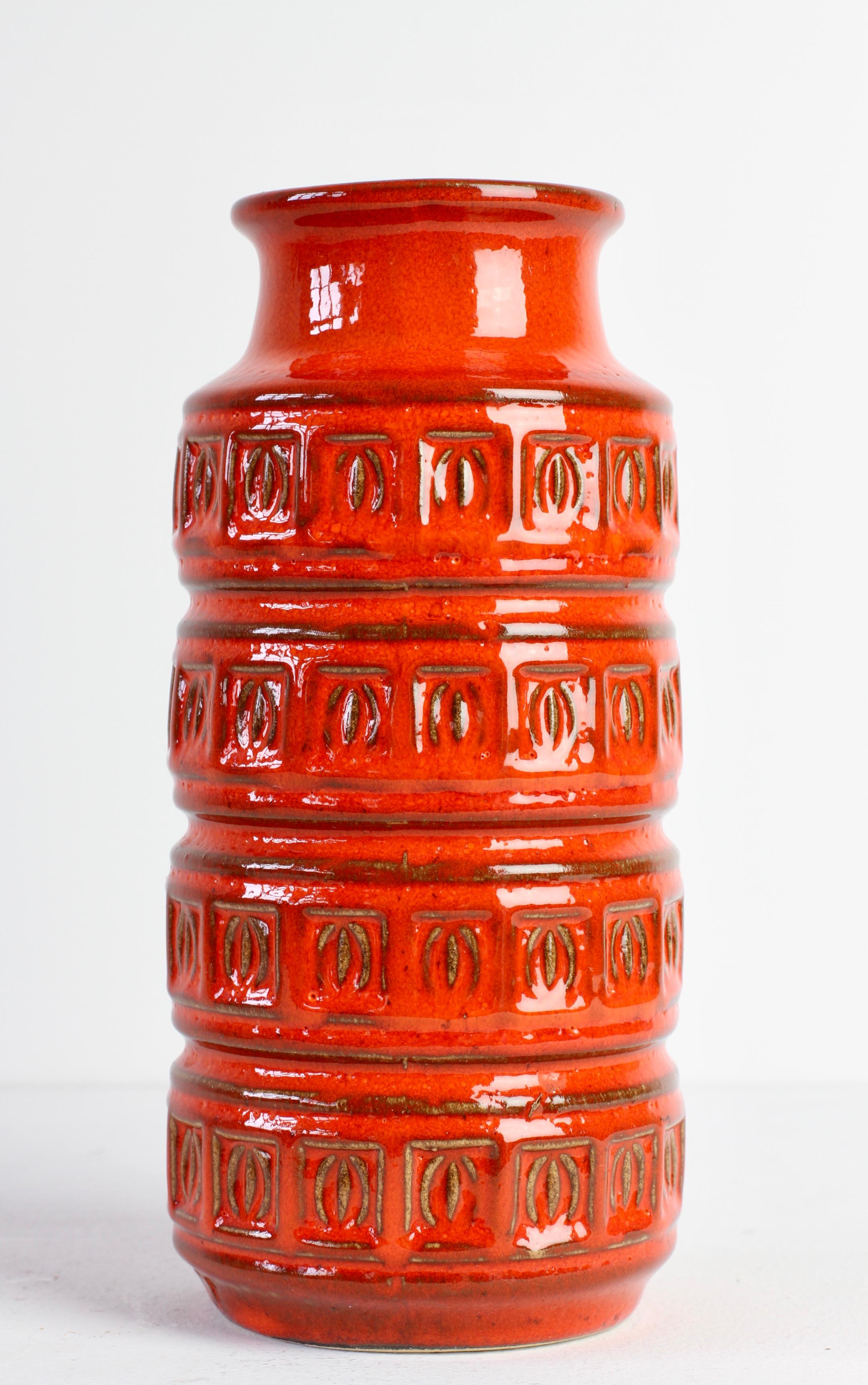 Small vintage midcentury West German pottery vase by Scheurich Keramik (ceramic), Germany, circa 1970. Beautiful bright red color with embossed relief pattern or motif. Classic 1970s pop art design.