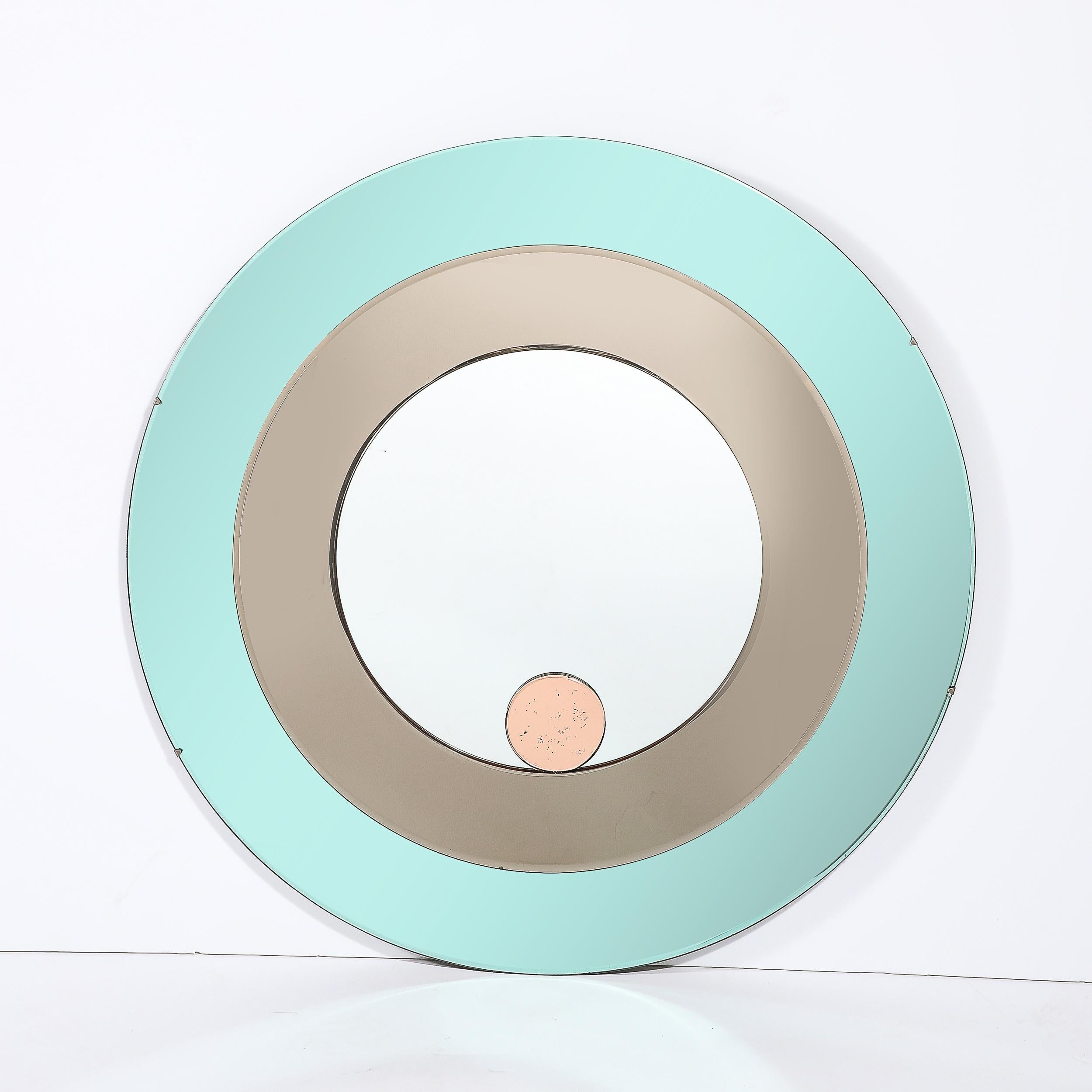 This sophisticated and elegant Mid-Century Modernist Round Tiered Mirror is by Fontana Arte and originates from Italy during the latter half of the 20th Century. Features a circular form with a total of four tiered mirror elements, beautifully