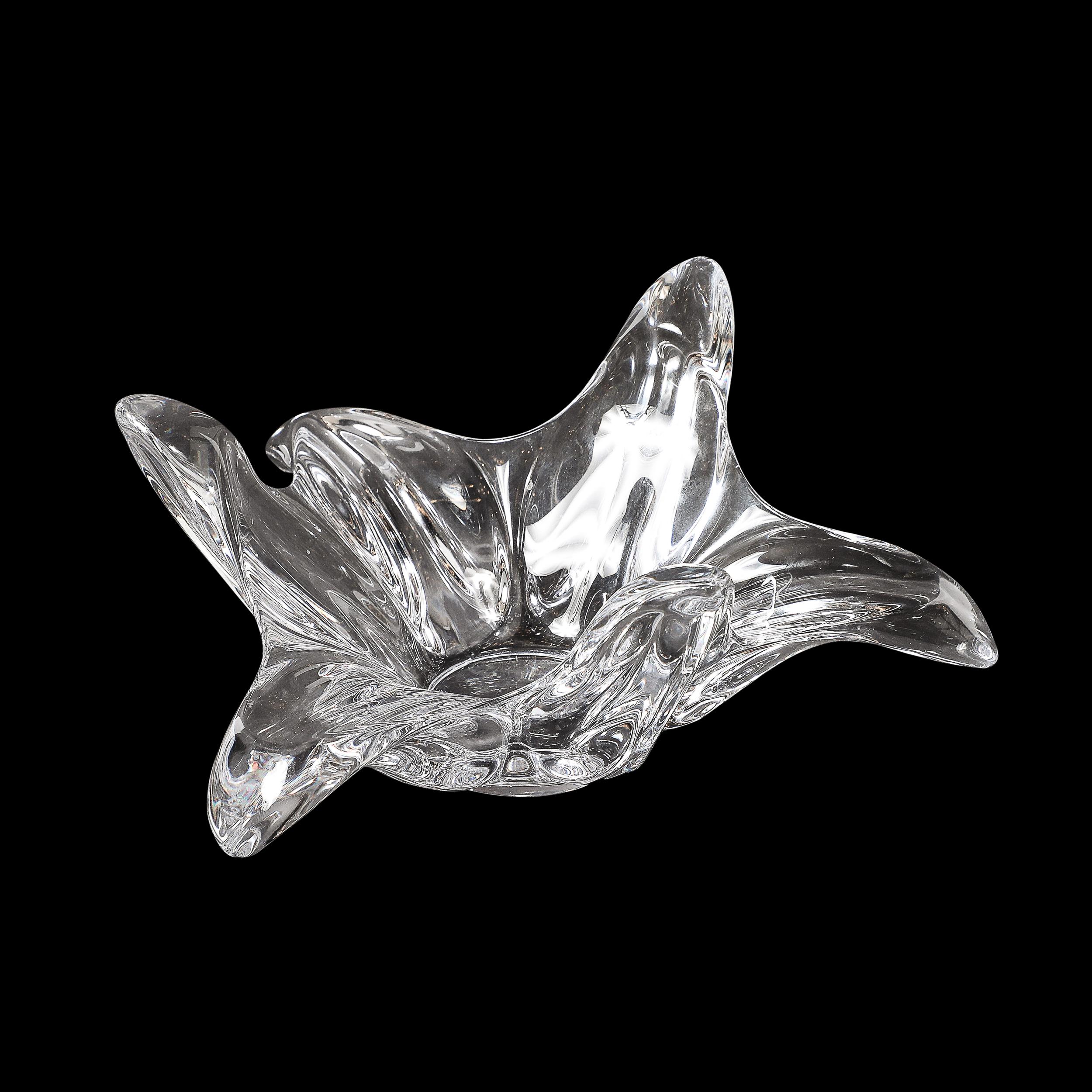 This beautiful Mid-Century Modernist Sculptural Art Vannes Splash Form Crystal Bowl originates from France, Circa 1950. Features a round flat base with elongated elements that alternate bending upwards and downwards. Rendered in crystal that