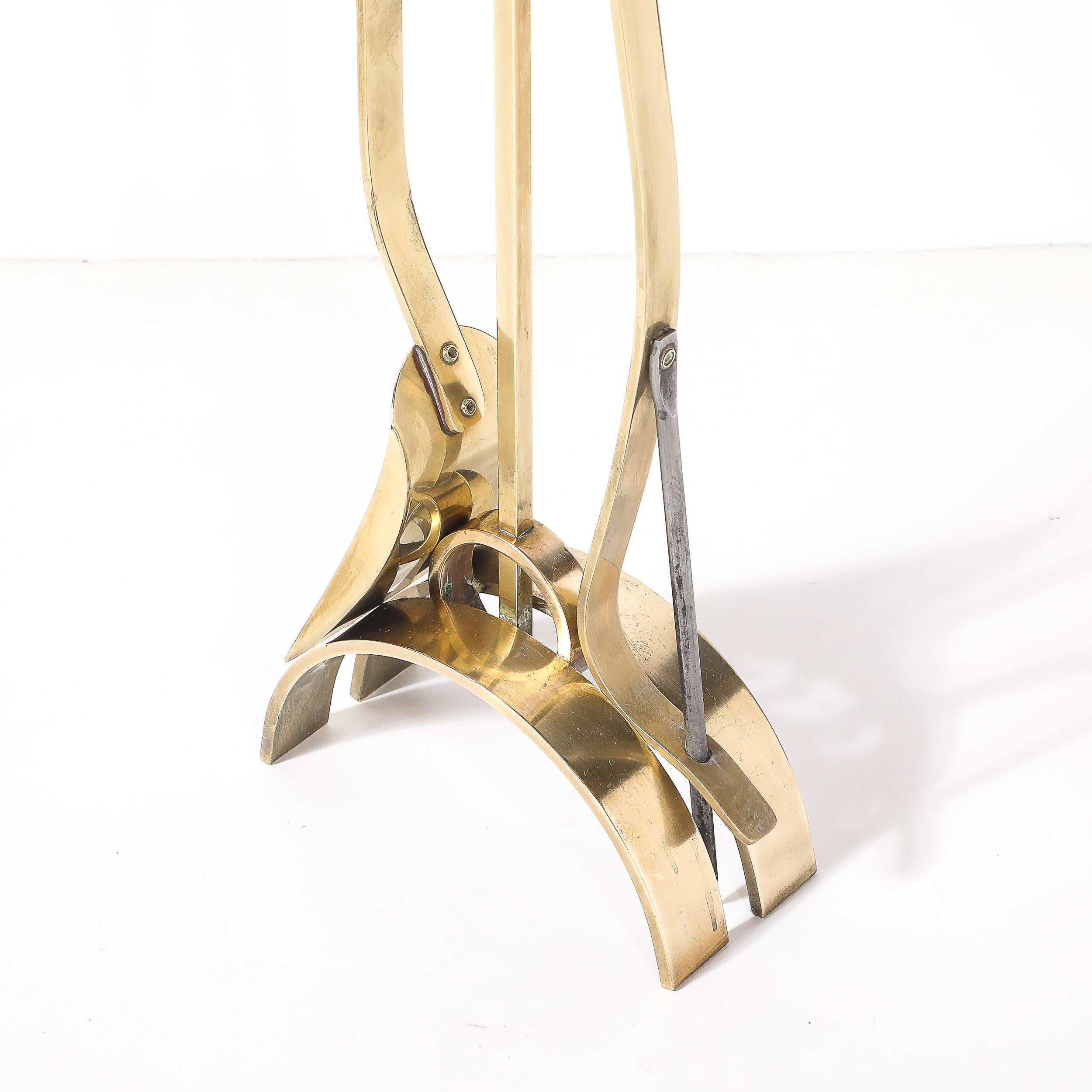 Mid-Century Modernist Sculptural Polished Brass Fire Tool Set by Donald Deskey mediados del siglo XX en venta