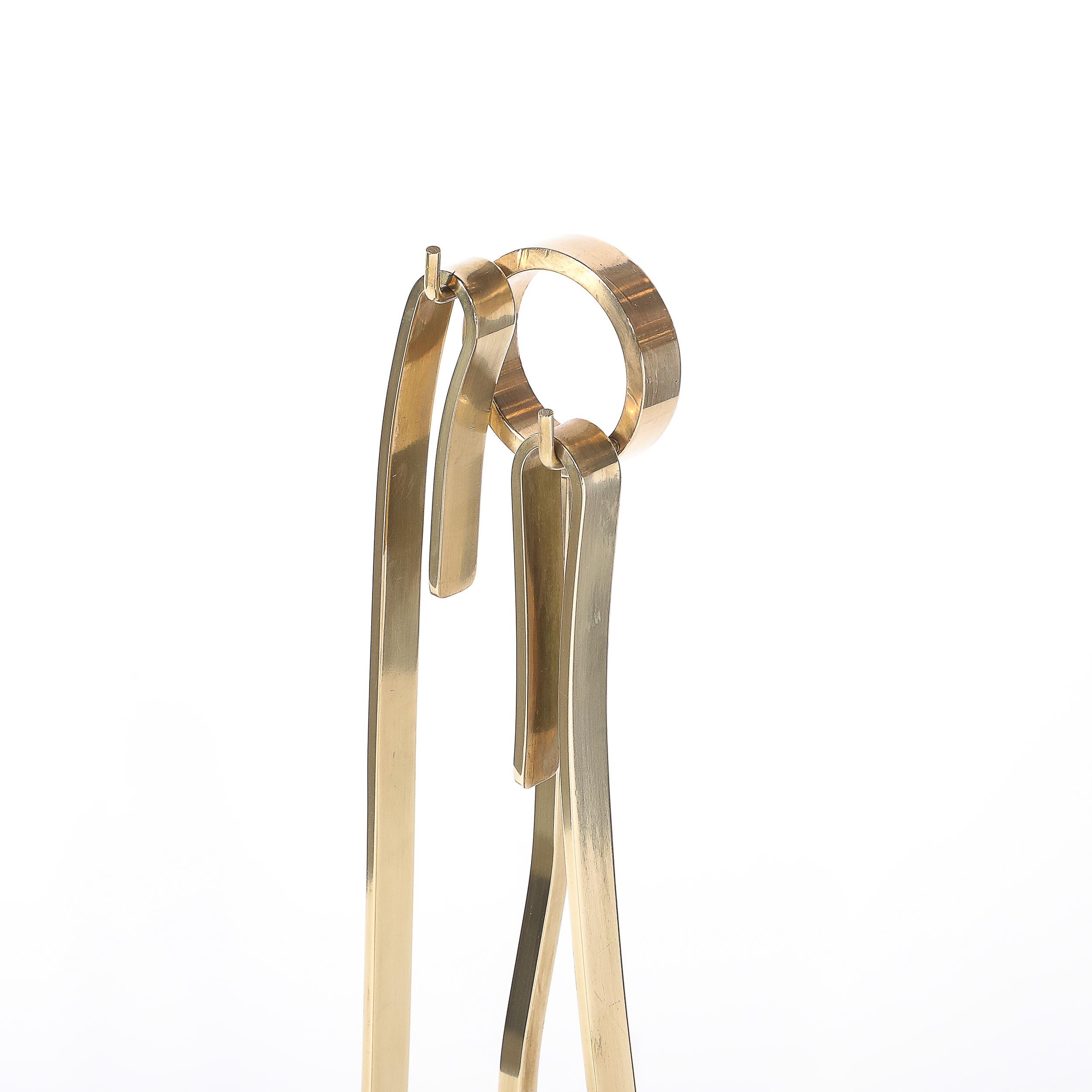 Mid-Century Modernist Sculptural Polished Brass Fire Tool Set by Donald Deskey Latón en venta