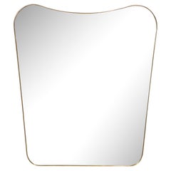 Retro Mid-Century Modernist Shield Form Polished Brass Wrapped Mirror