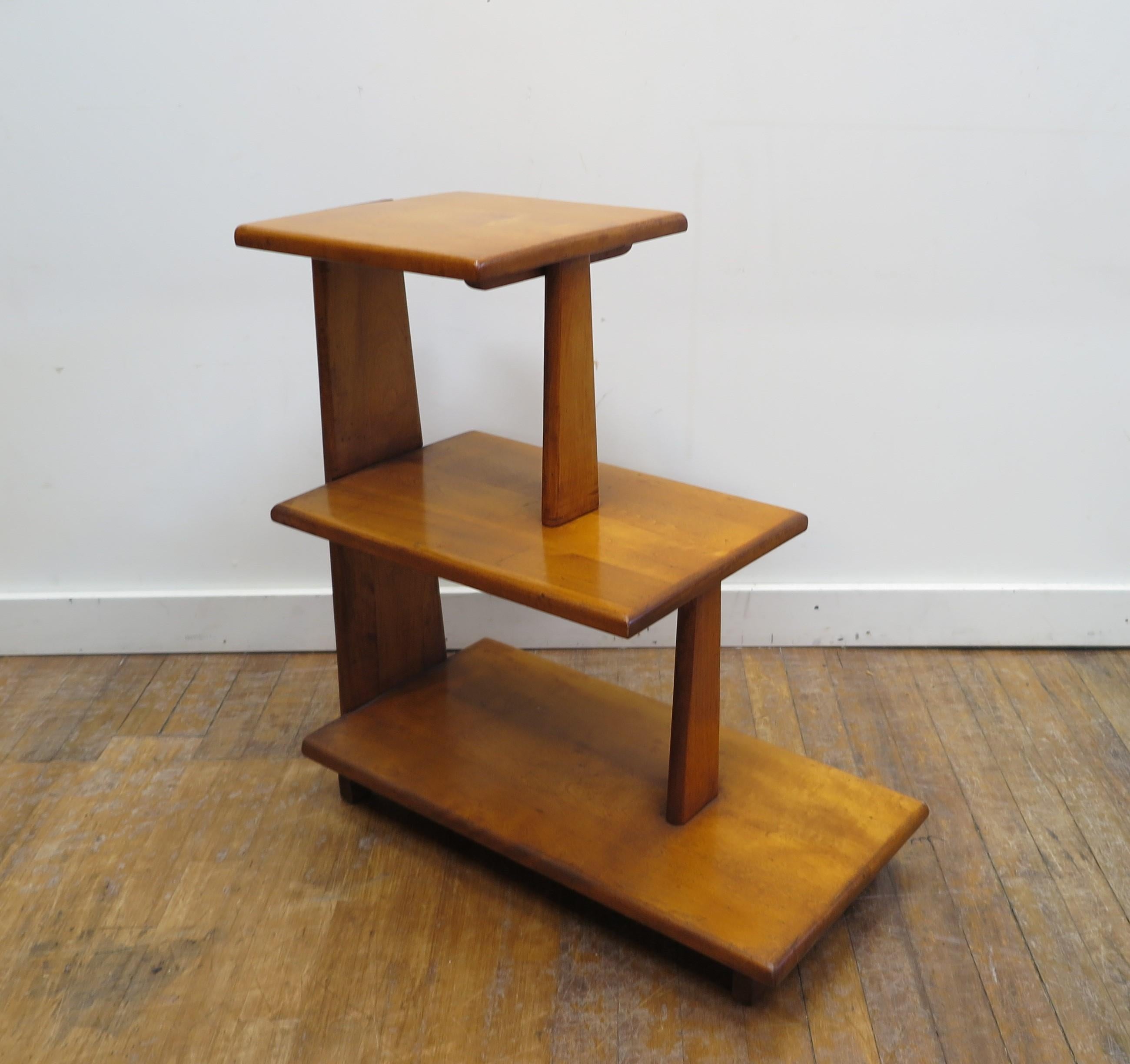 Mid Century Modernist step table. Modernist side table with three shelves made of Maple. Simple elegant and modern. In very good original condition. 1940's American.
