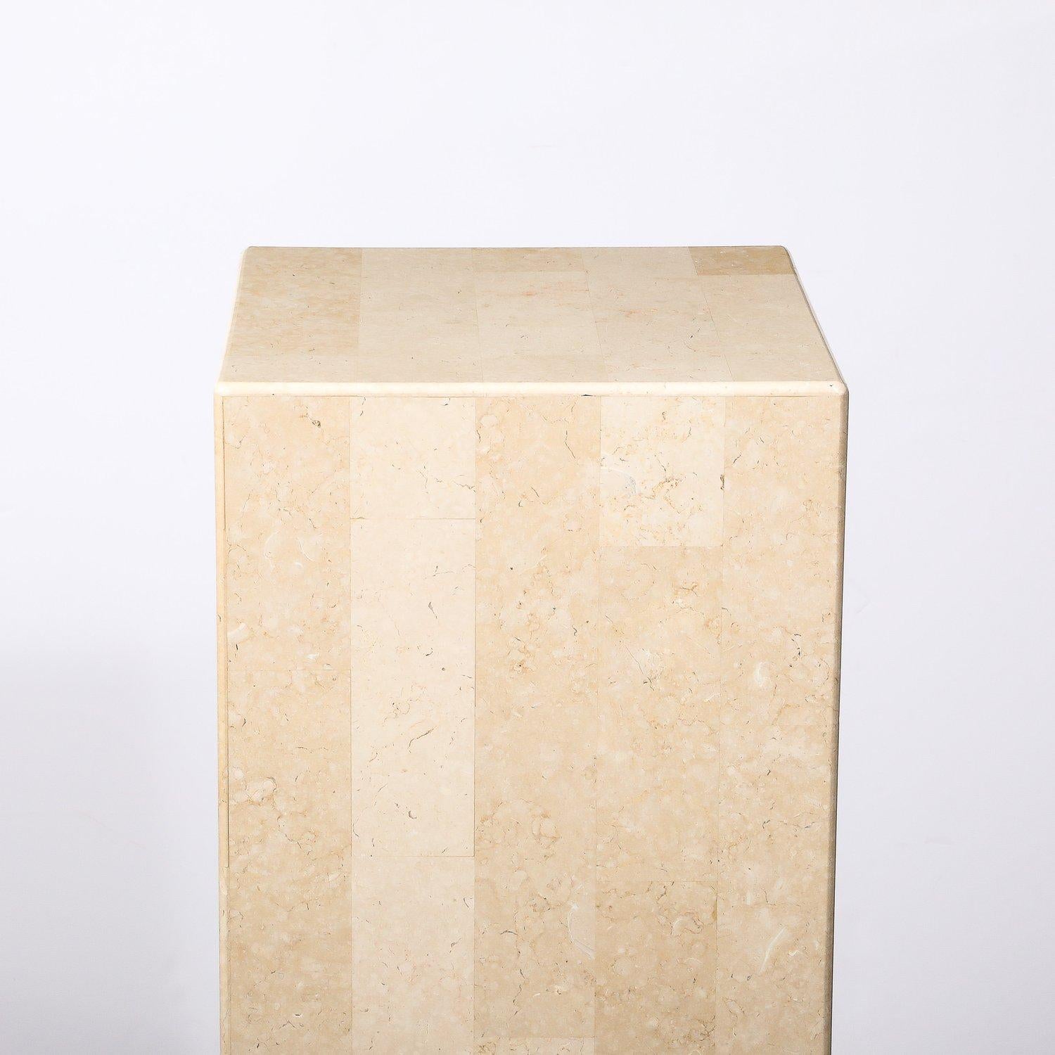 This minimal and elegant Mid-Century Modernist Tessellated Stone Pedestal is by Maitland Smith and originates from the United States, Circa 1980. It features a tall rectangular profile composed in tessellated stone, seamlessly assembled and with