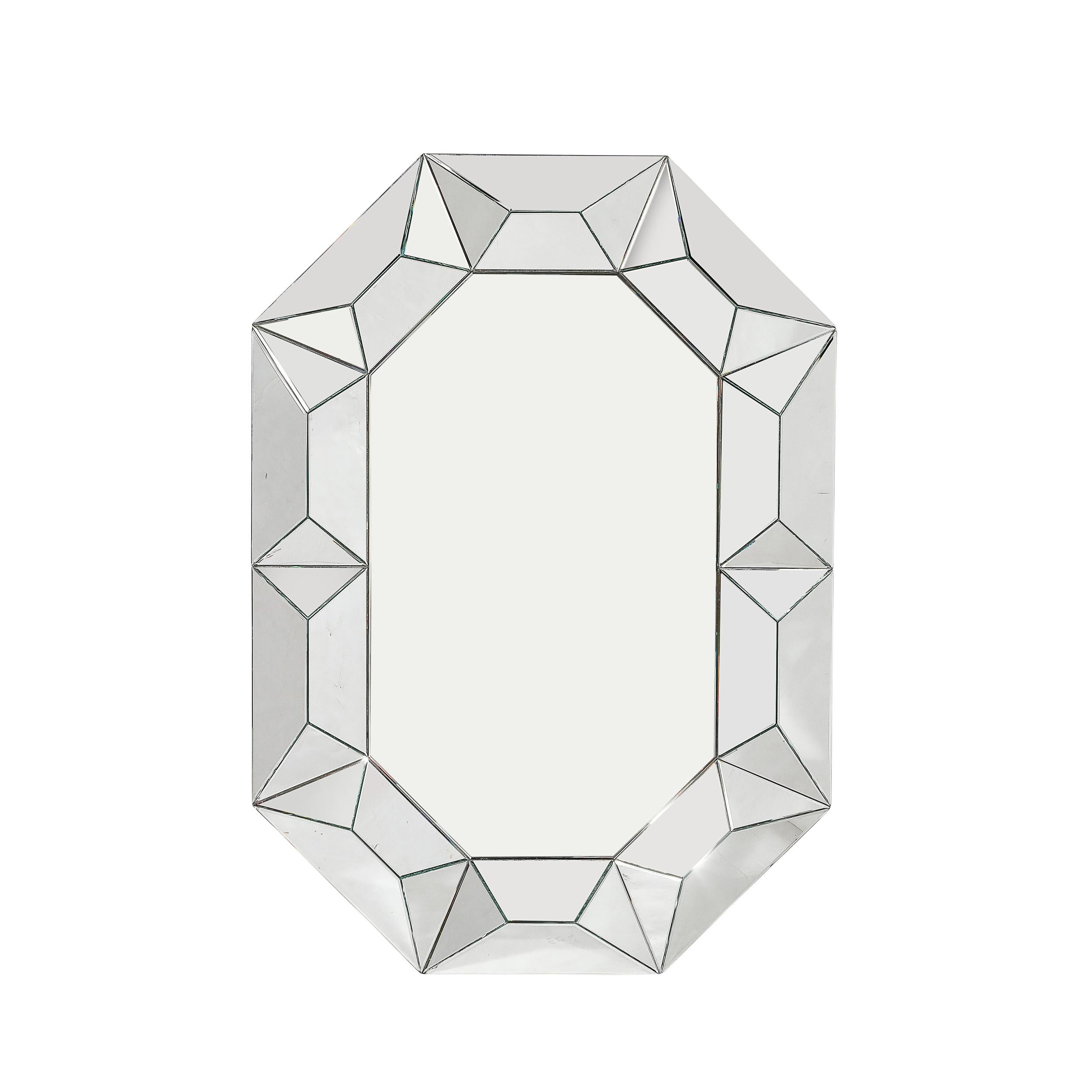 This bold and elegantly geometric Mid-Century Modernist Tessellated Octagonal Shadowbox Mirror originates from the United States, Circa 1980. Features an octagonal profile with a substantial border composed of tessellated triangular and trapezoidal