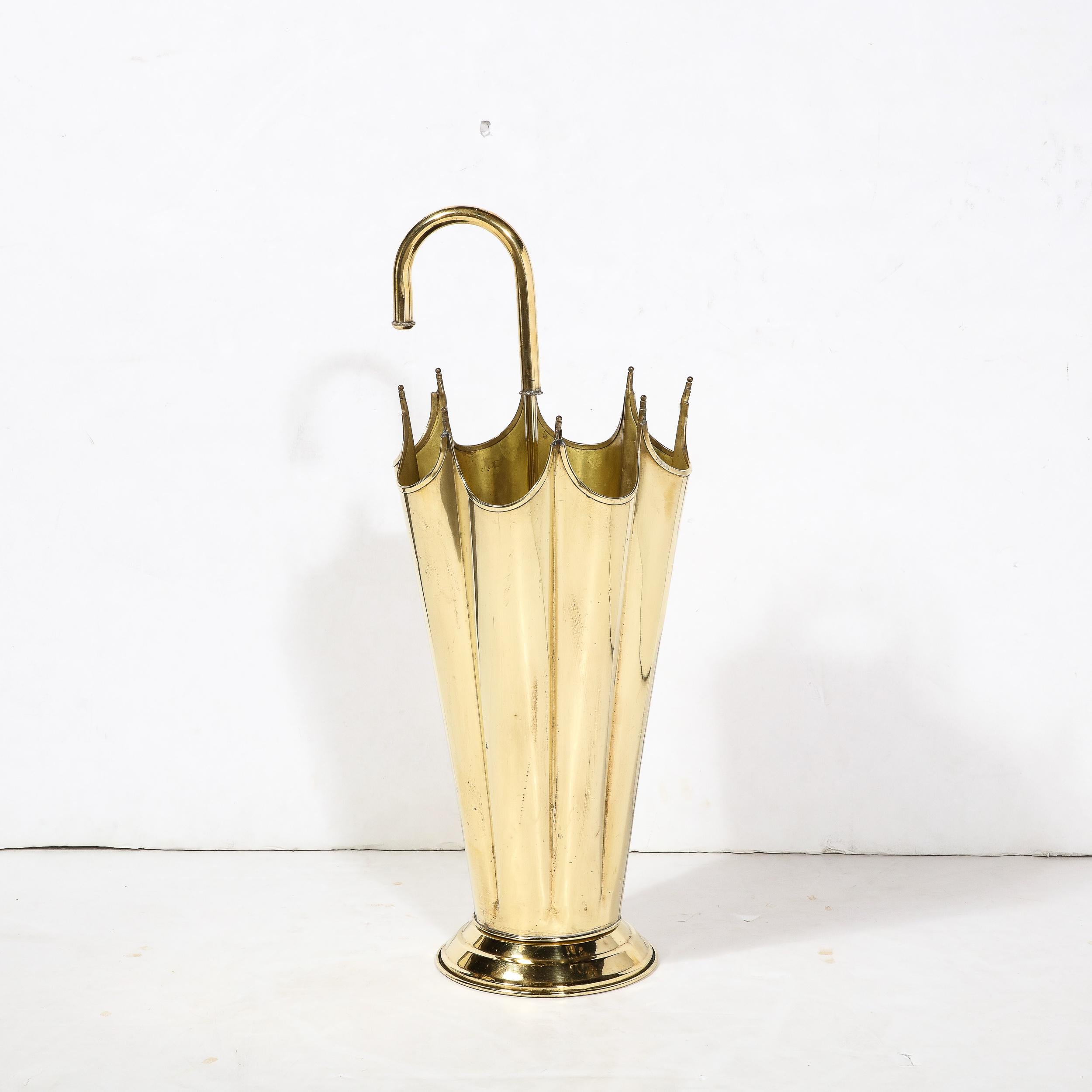 This Mid-Century Modernist Umbrella Stand is a charming and thematically apt piece rendered in extremely high quality brass work and with stunning attention to detail, originating from Austria, Circa 1950. The intended use is evident in the form of