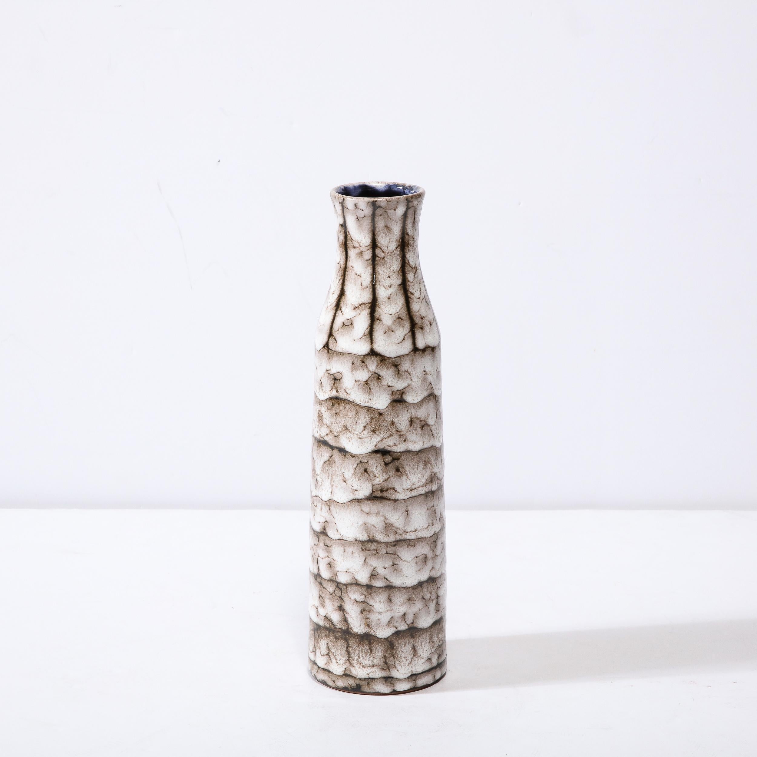 This Mid-Century Modernist Ceramic Vase With Banded Detailing is a beautiful example of Post War European Ceramics, realized in Hódmezovasarhely Majolikagyár, Hungary Circa 1960. With a Stunning textural finish composed in Cream White and Blackened