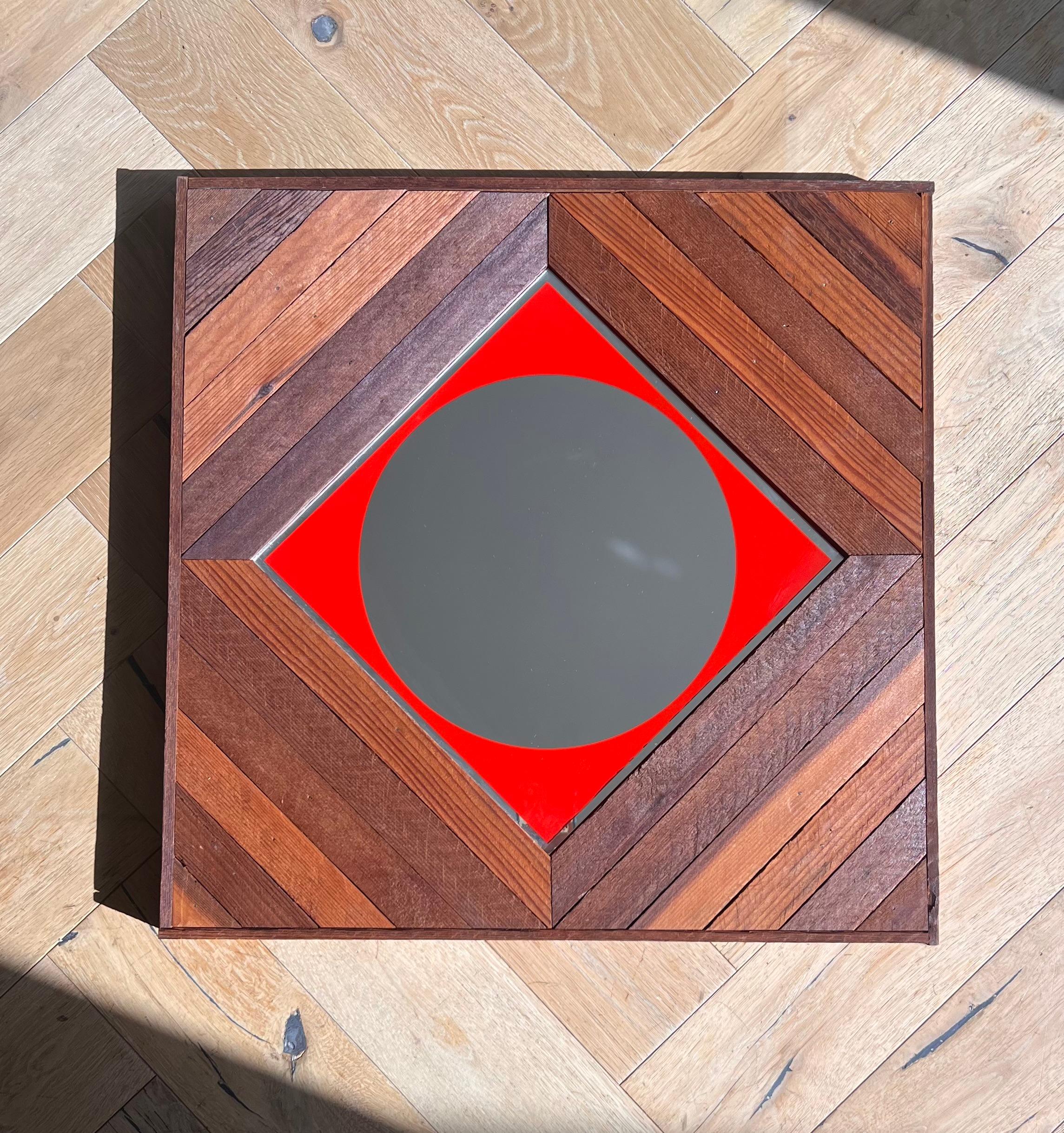 A unique mid century modern craftsman wooden mirror with red square accent, circa early 1960s. Signs of age are minor and include slight scuffs to wood. Ready to hang. Pick up in central west Los Angeles or we ship worldwide.