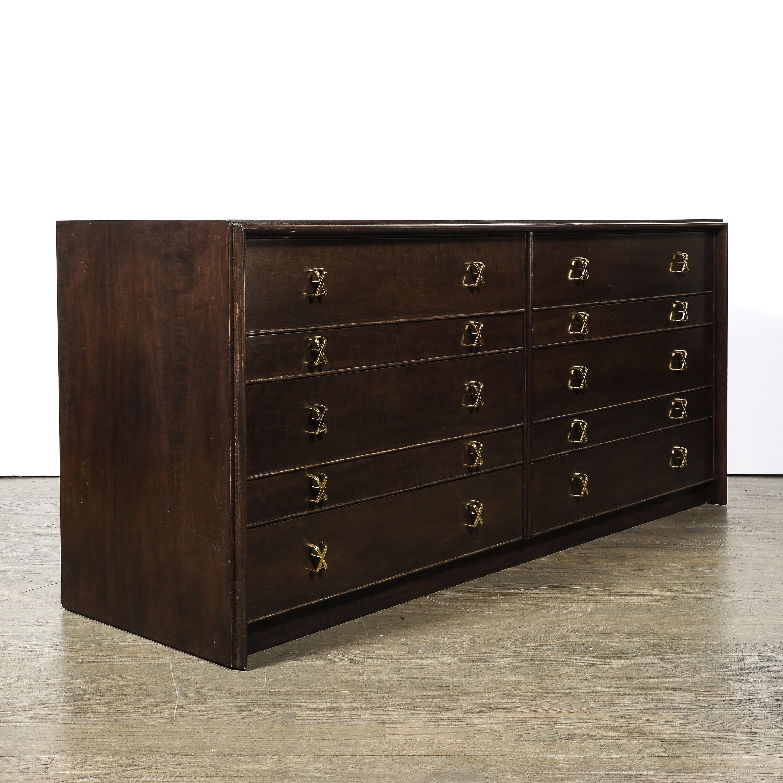 This beautifully fabricated and distinctive Mid-Century Modernist X Form low chest  in rich brown Walnut is by the esteemed designer Paul Frankl and originates from the United States, Circa 1950. Features a lovely rectilinear composition with